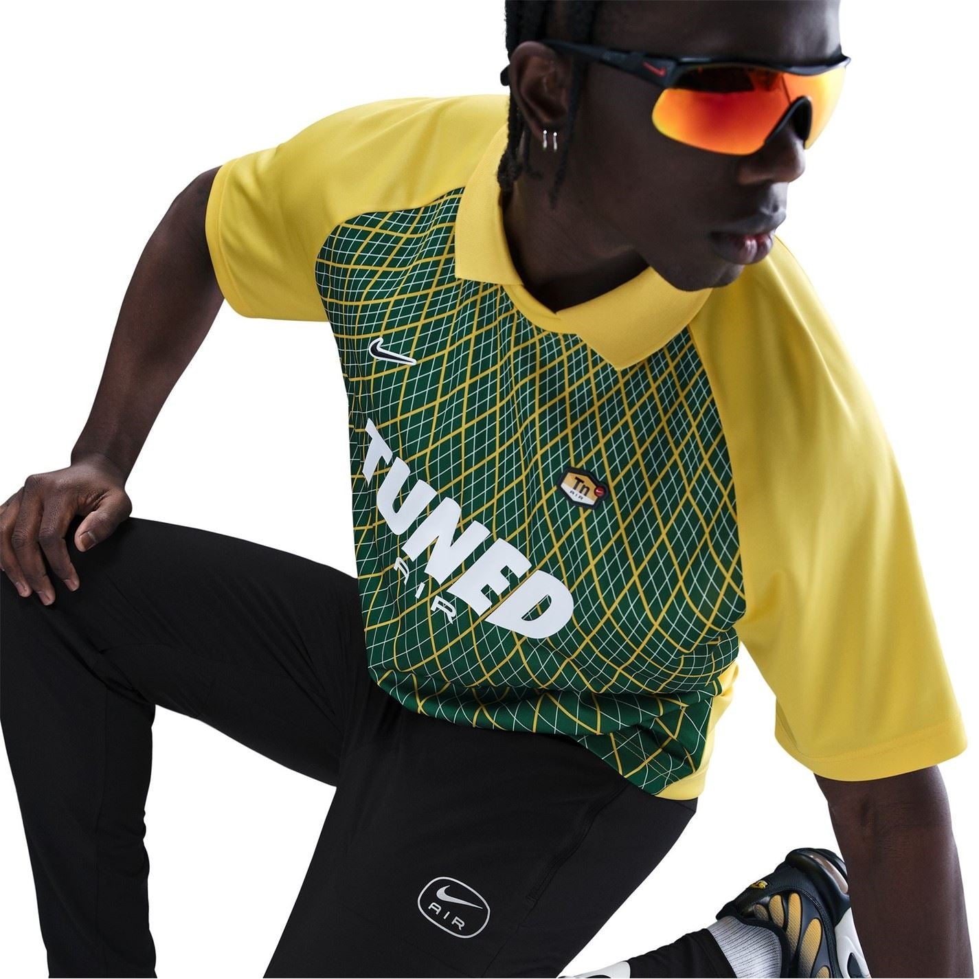 Nike Air Run Solid Patterned Track Pants