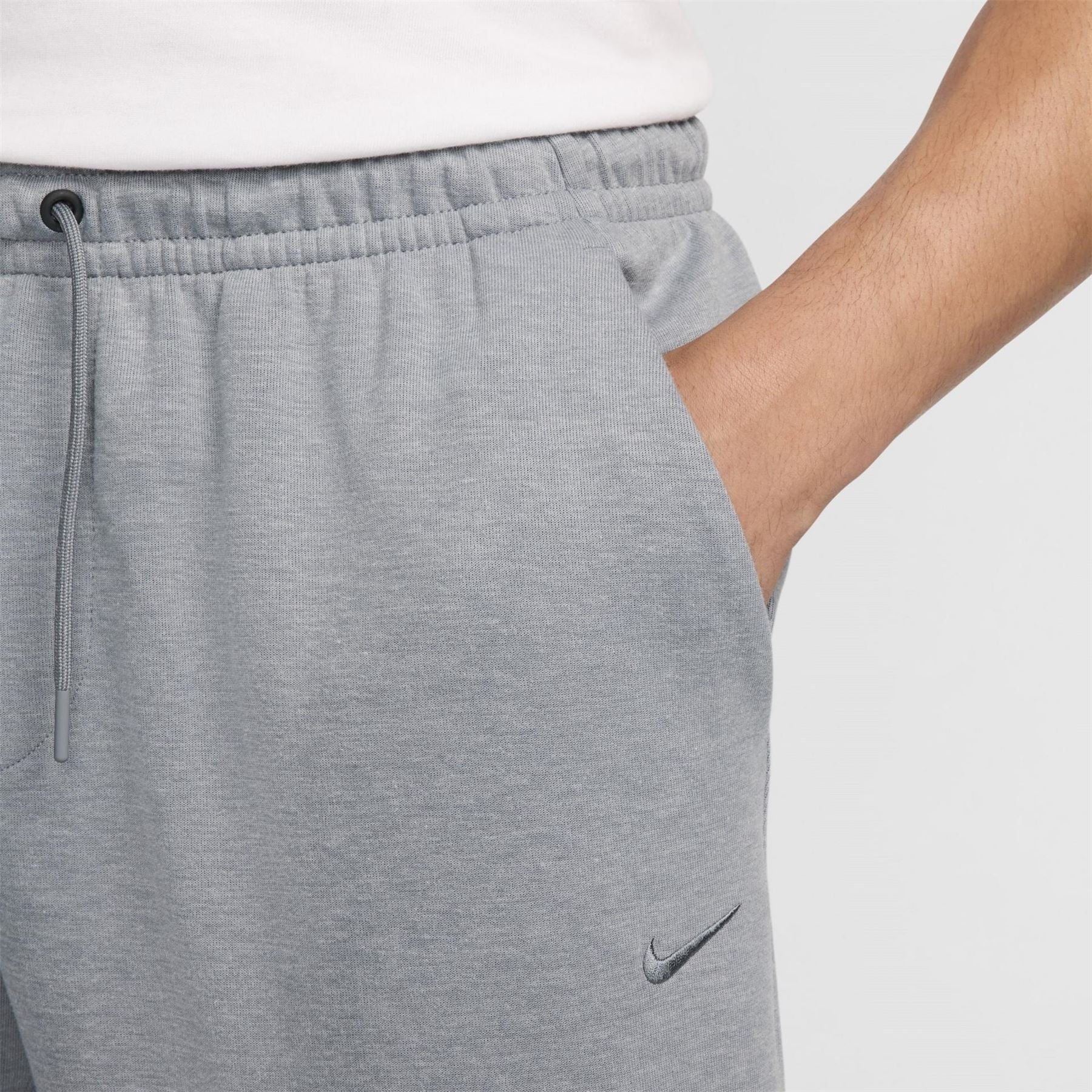 Nike Primary Solid Patterned Slim Joggers