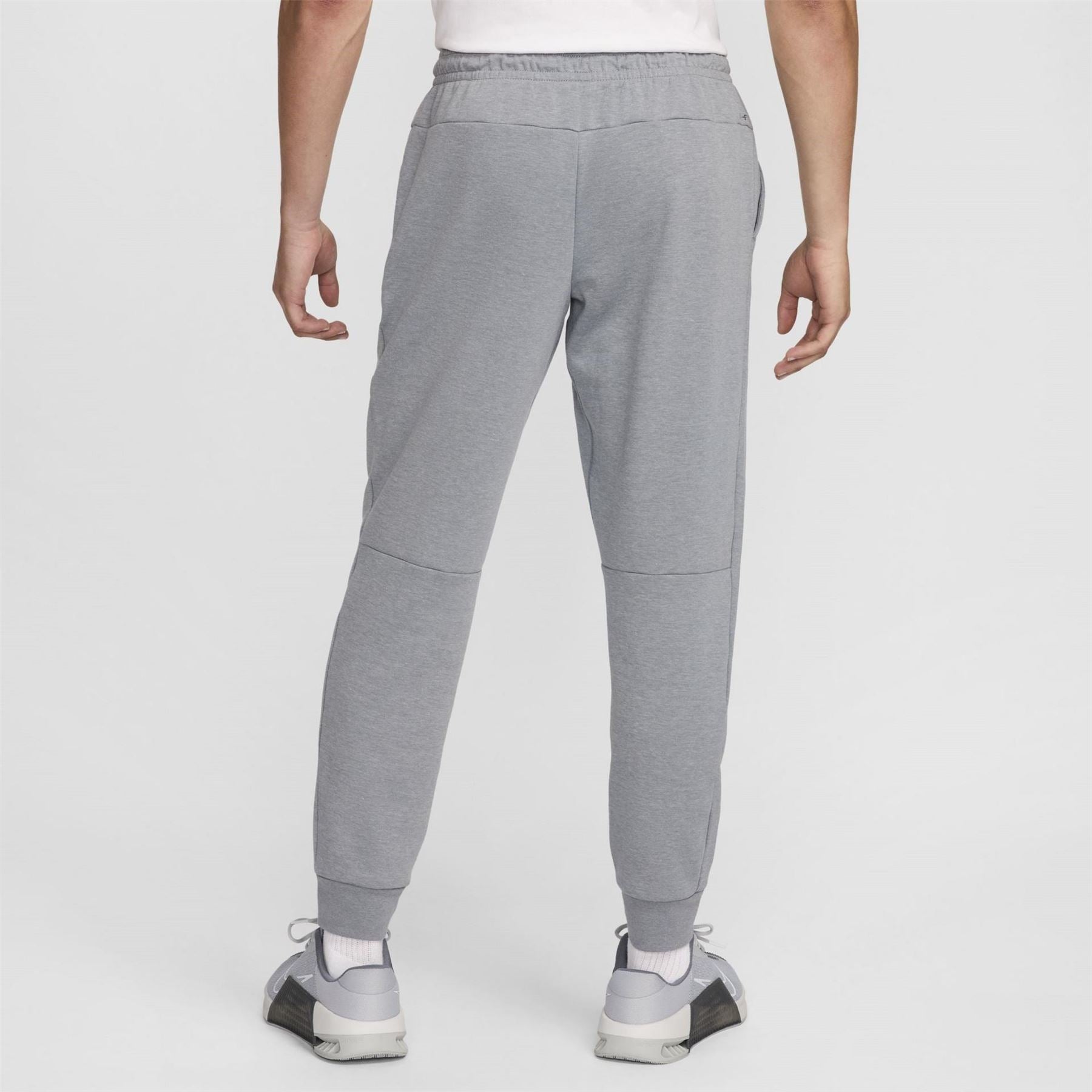 Nike Primary Solid Patterned Slim Joggers