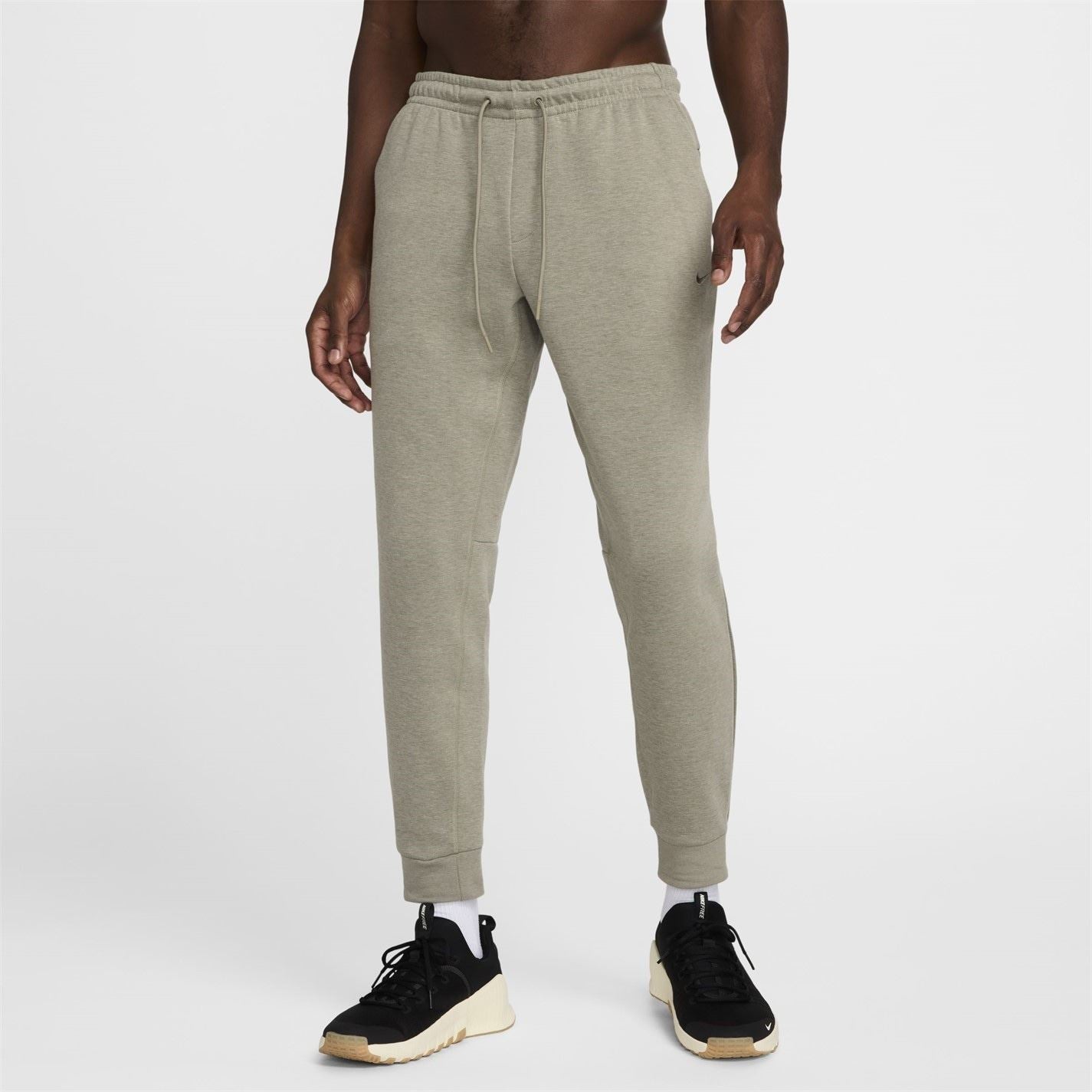 Nike Primary Solid Patterned Slim Joggers
