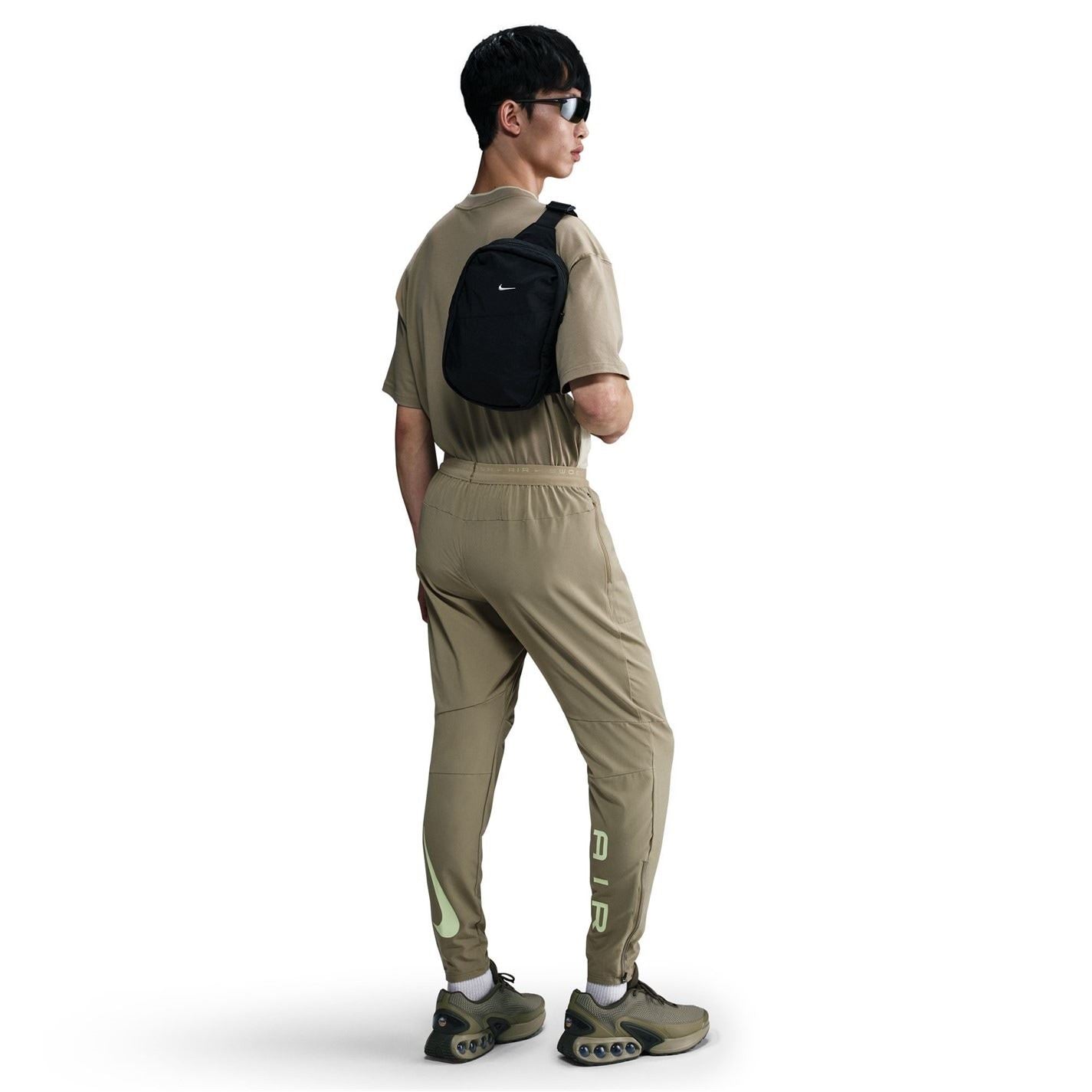 Nike Air Run Solid Patterned Track Pants