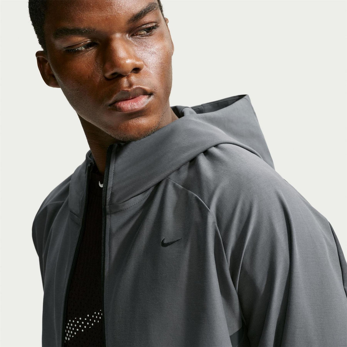 Nike Tech Solid Patterned Hooded Windbreaker with Woven Cuff