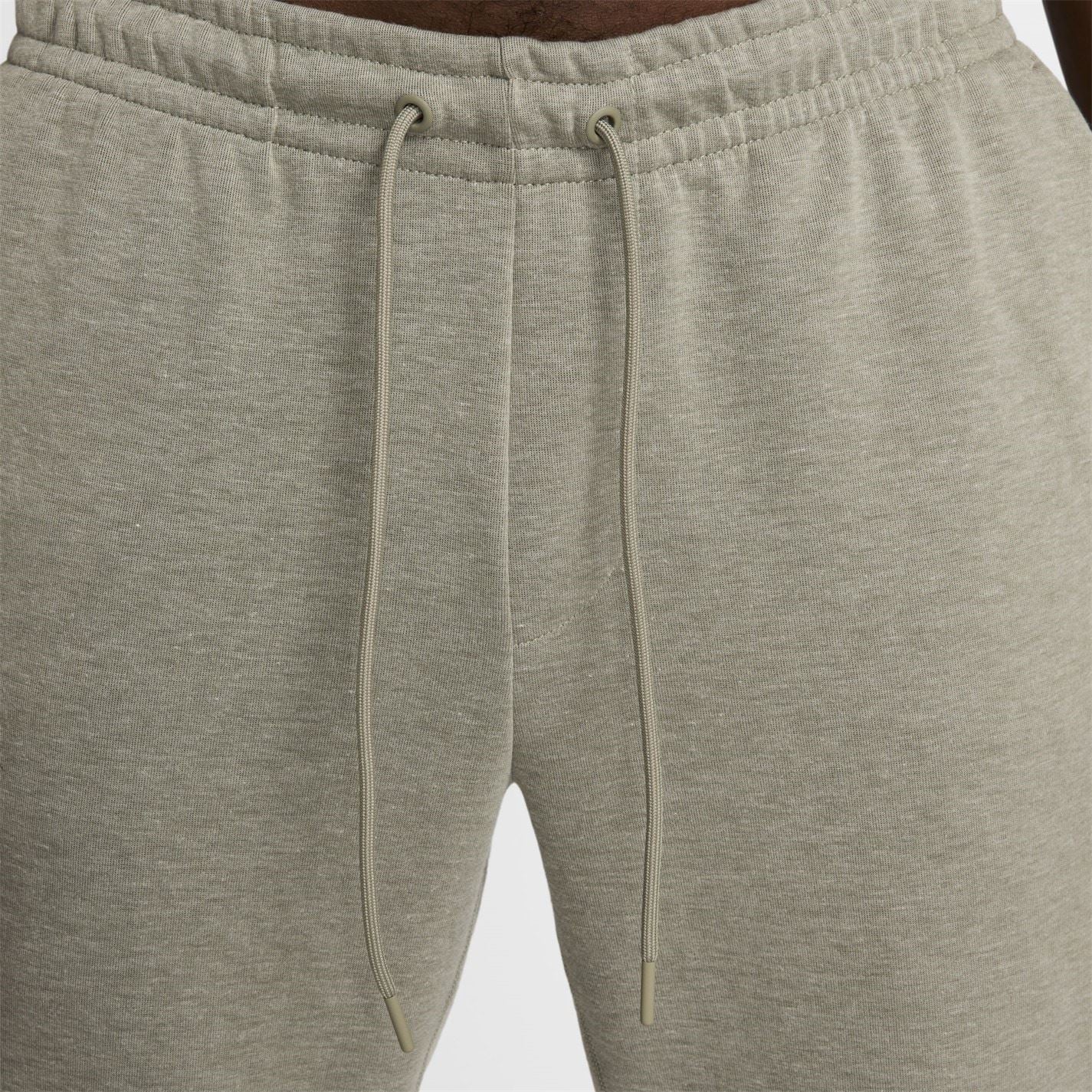 Nike Primary Solid Patterned Slim Joggers