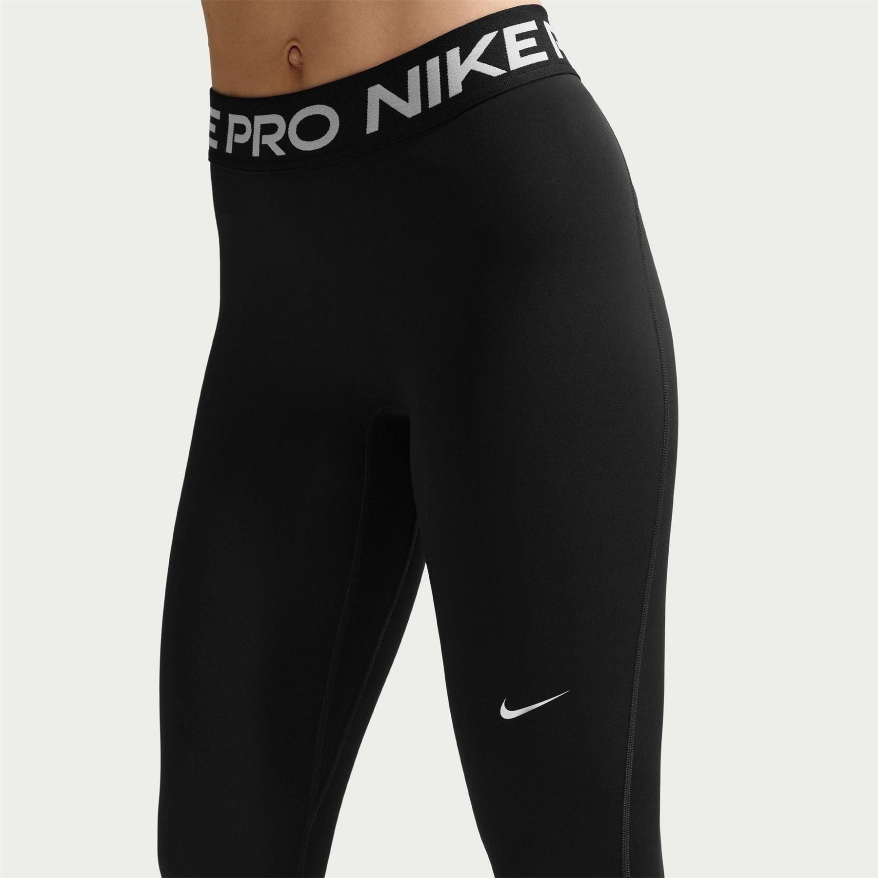 Nike Essential Solid Patterned Skinny Fit Leggings