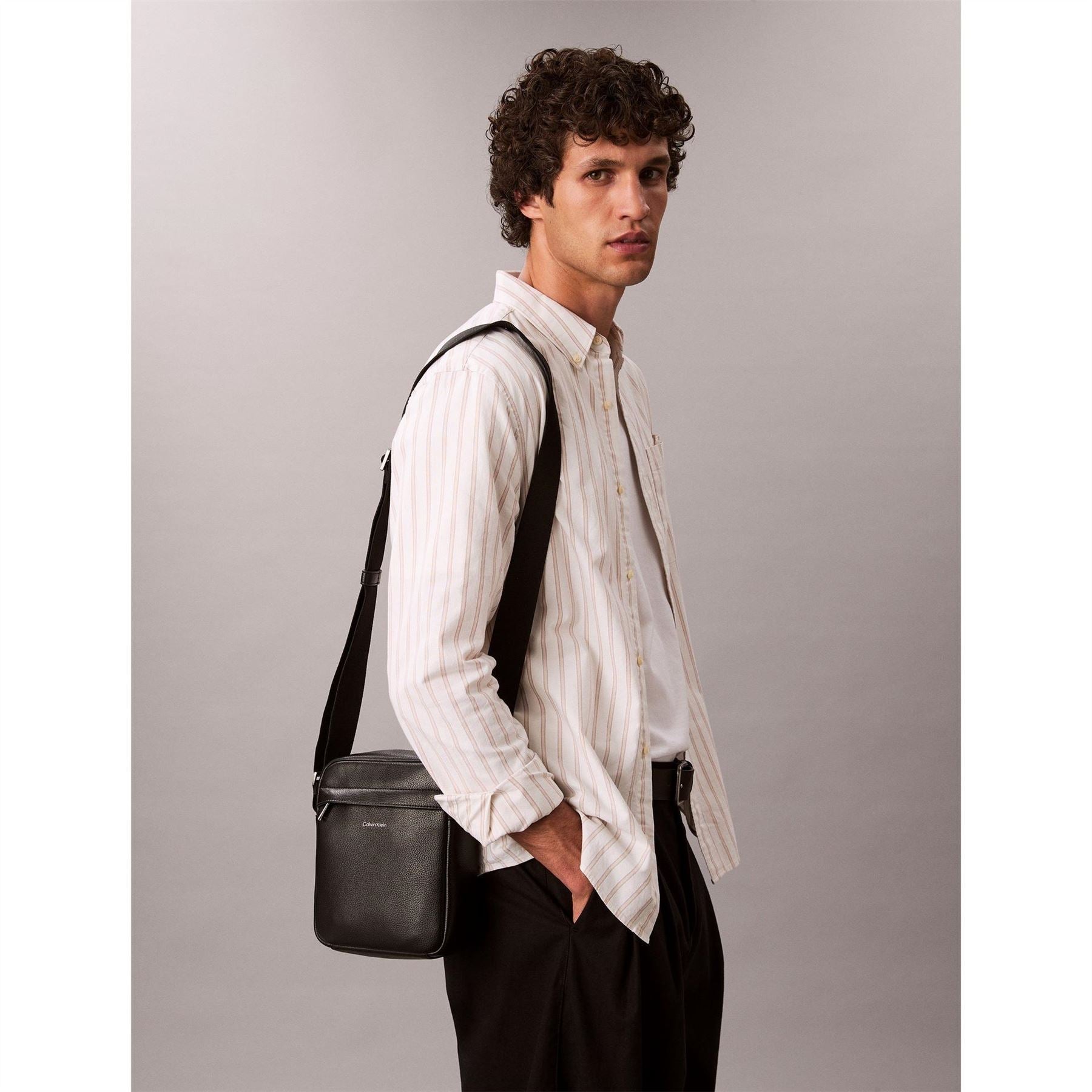 Calvin Klein Raised Reporter Cross Body Bag