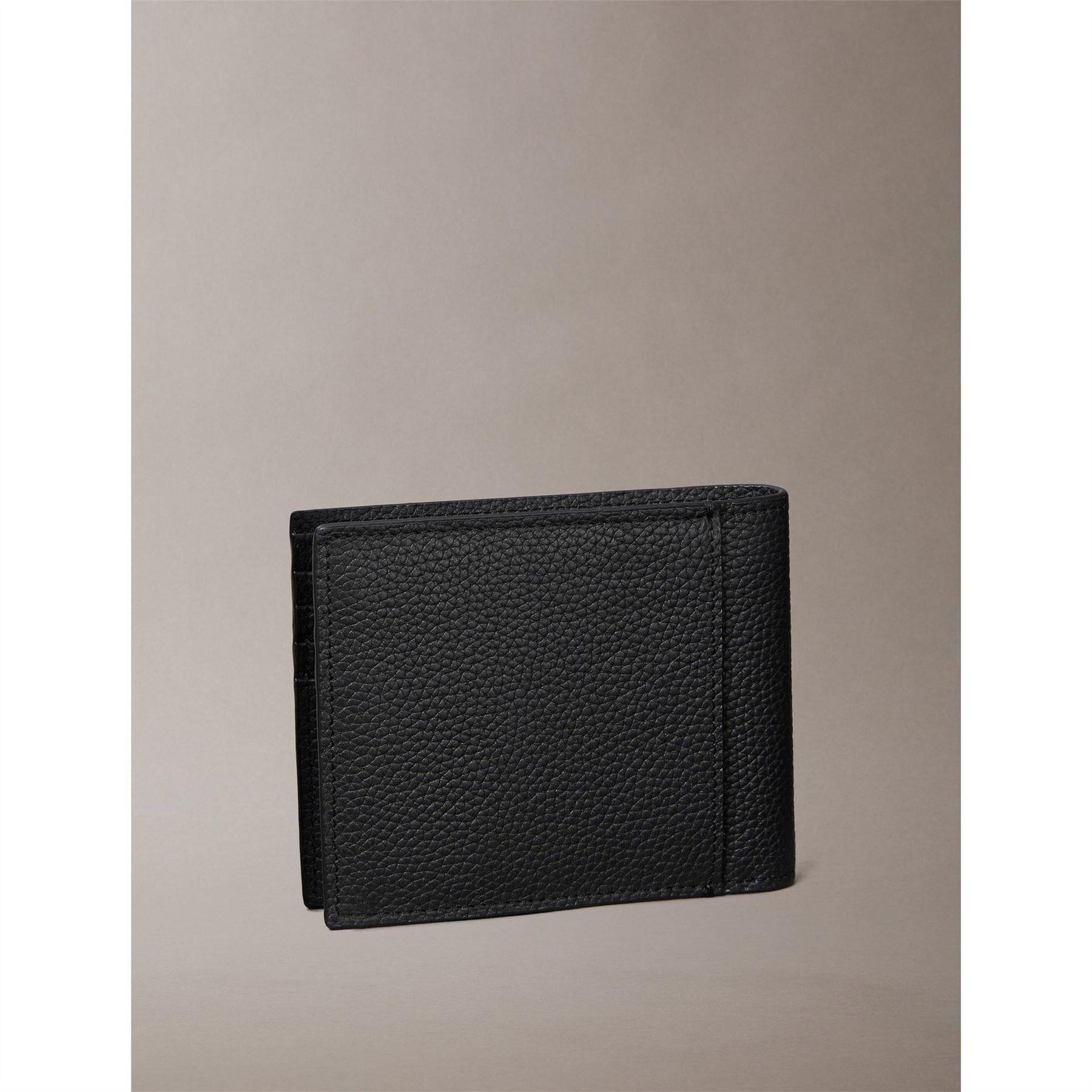 Calvin Klein Embossed Logo Leather Bifold Wallet