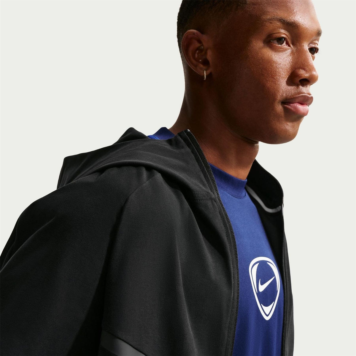 Nike Tech Solid Patterned Hooded Windbreaker with Woven Cuff