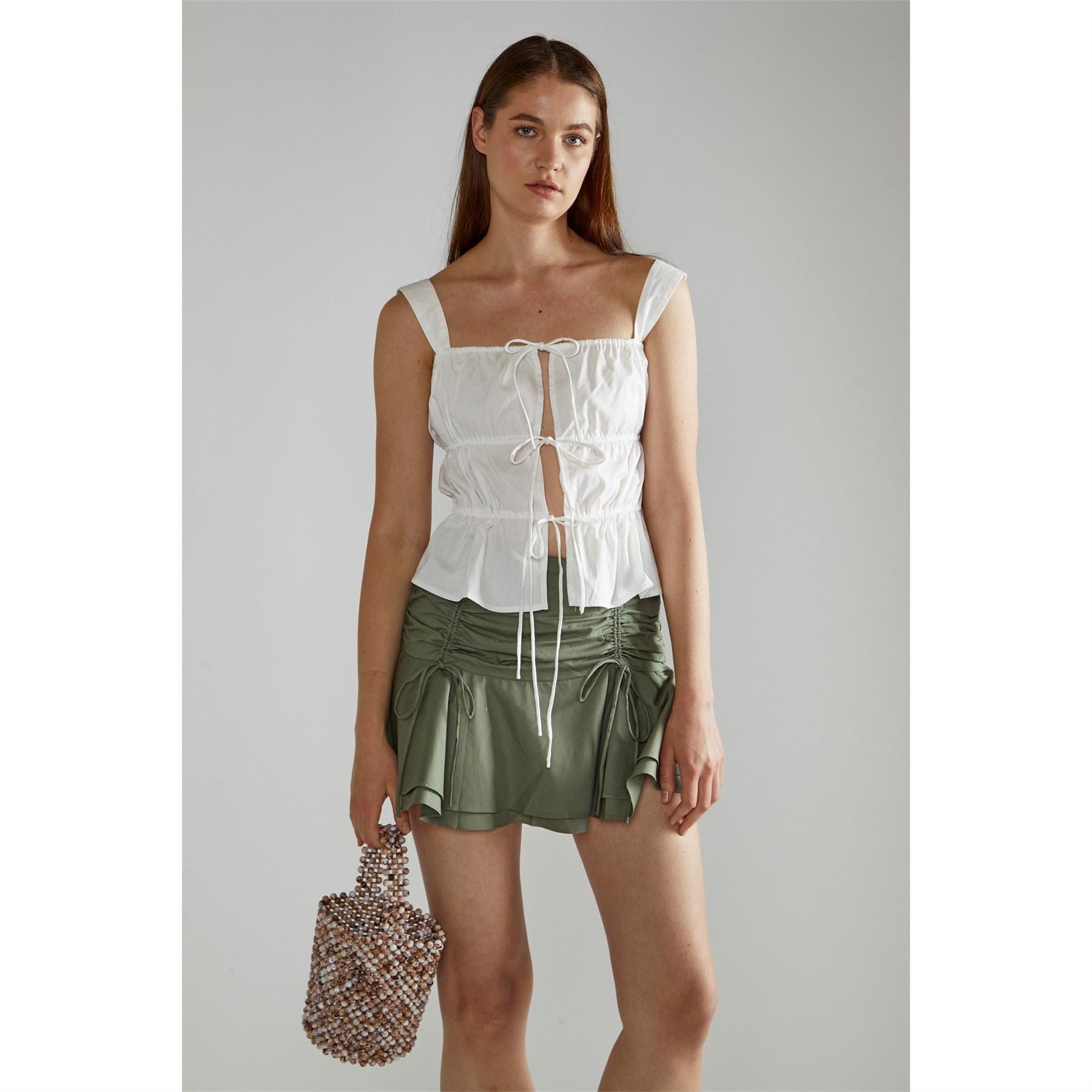 Narrated White Square Neck Sleeveless Top