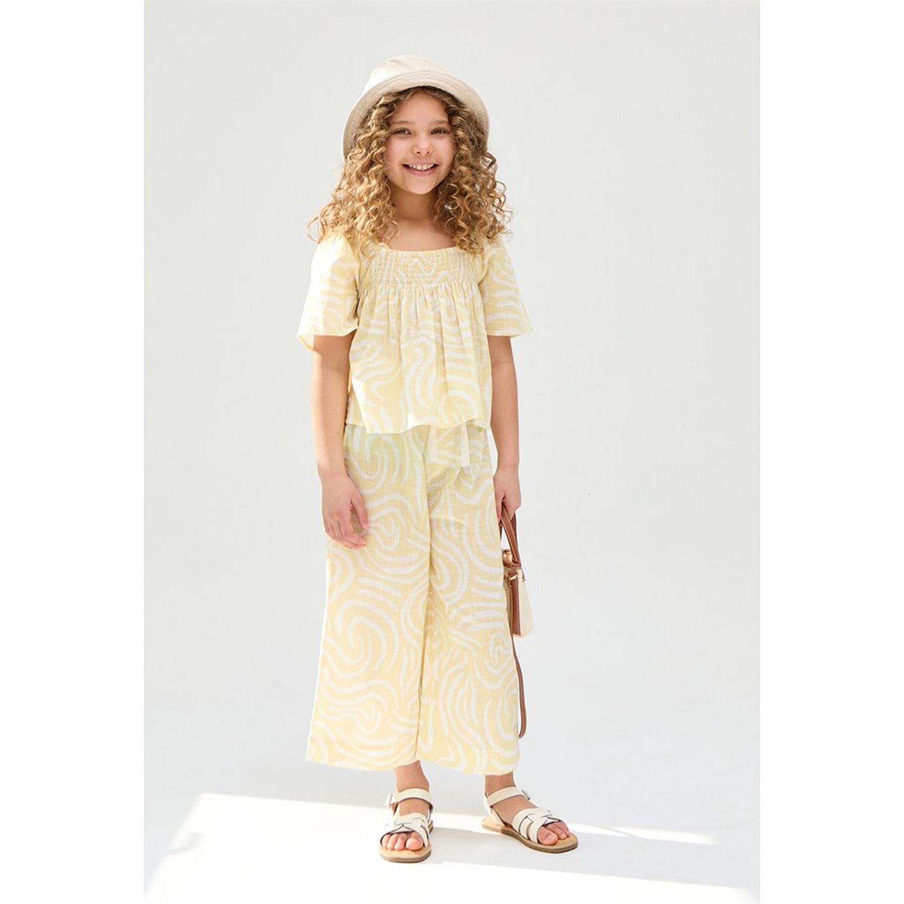 Raffya Kids Nia Shirred Neck Zebra Swirl Print Co Ords Set In Yellow