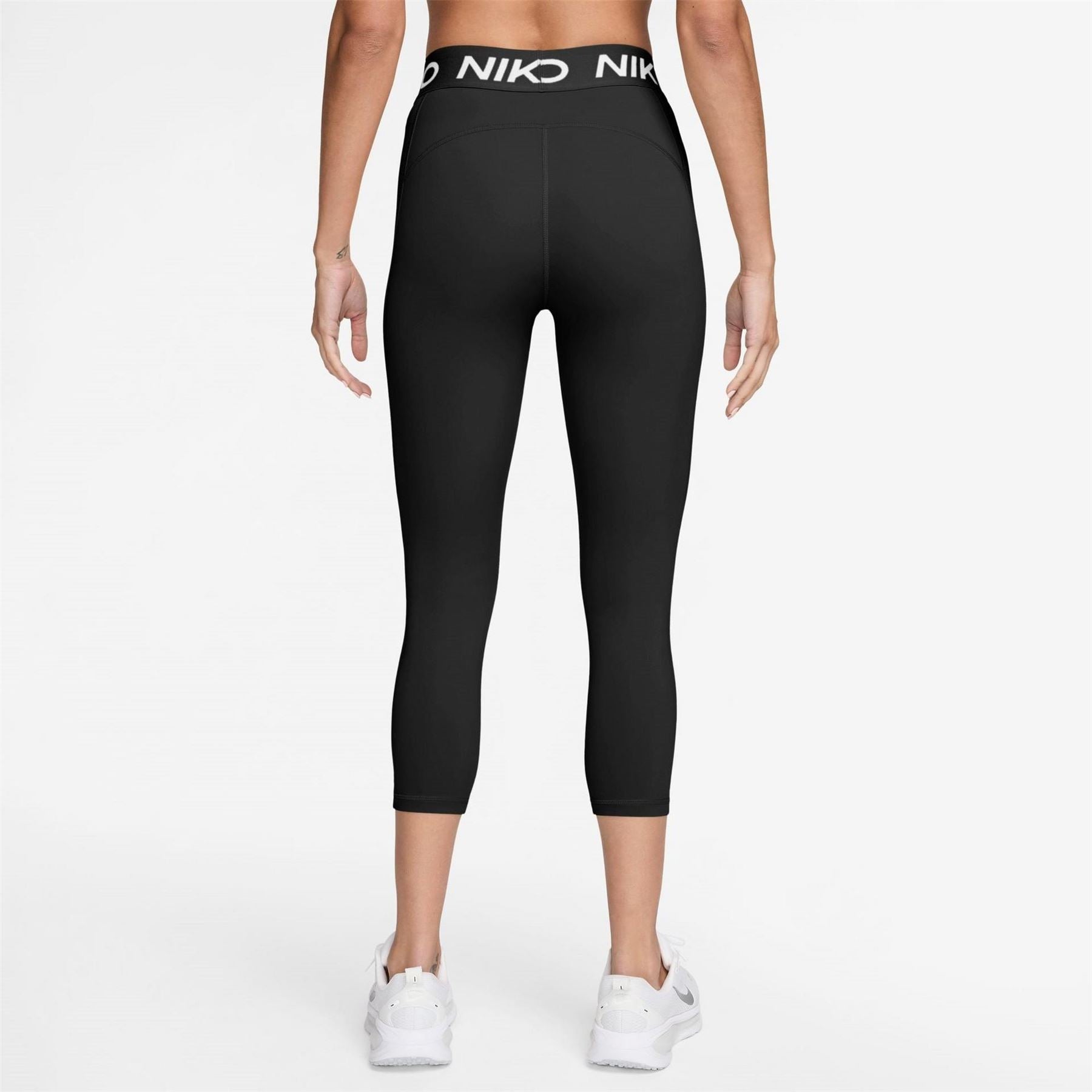 Nike Essential Solid Patterned Skinny Fit Leggings