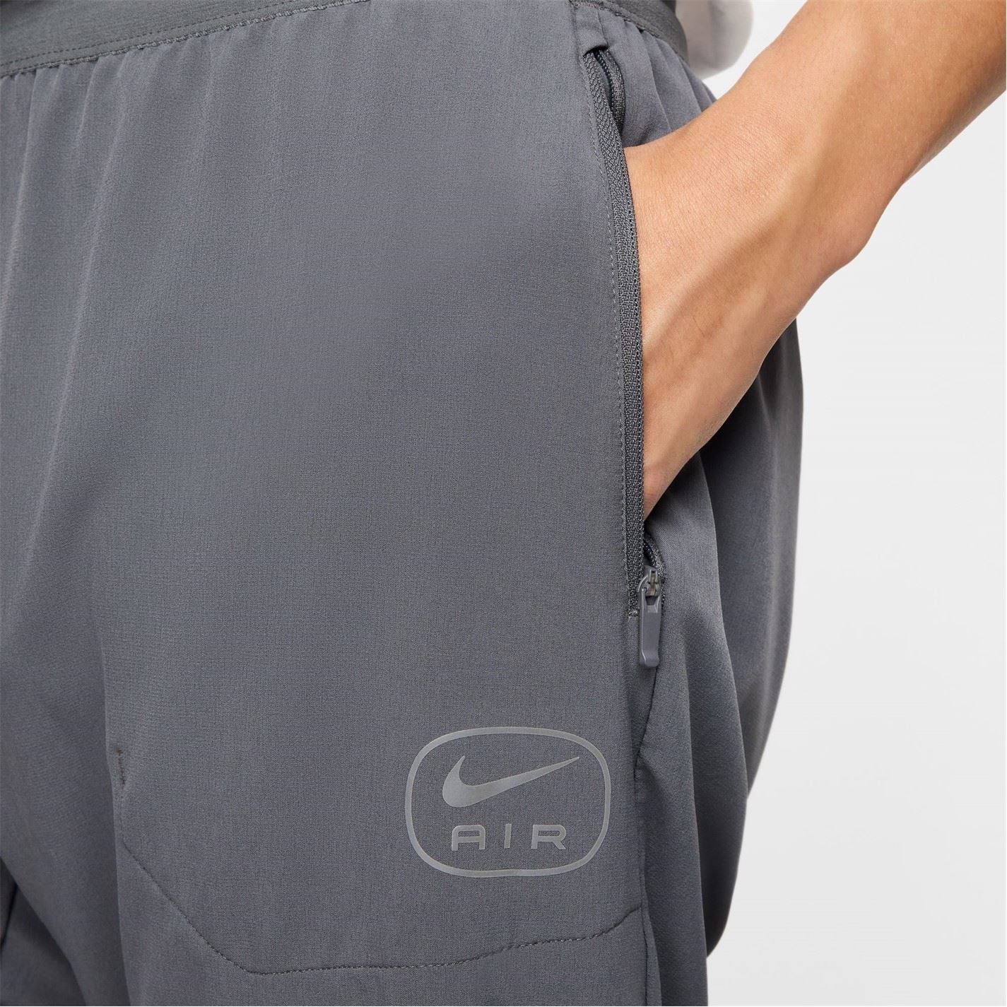 Nike Air Run Solid Patterned Track Pants