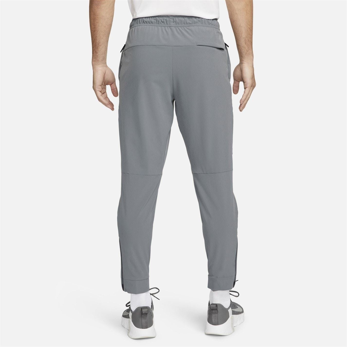 Nike Unlimited Dri Fit Zipped Pocket Straight Leg Running Pants