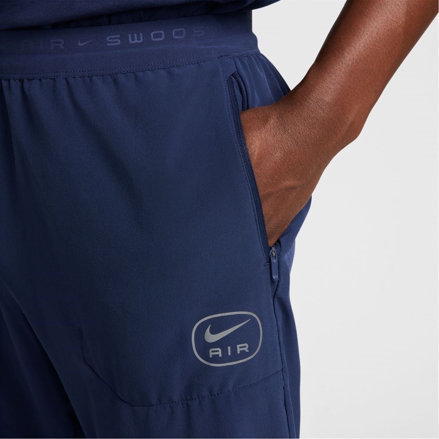 Nike Air Run Solid Patterned Track Pants