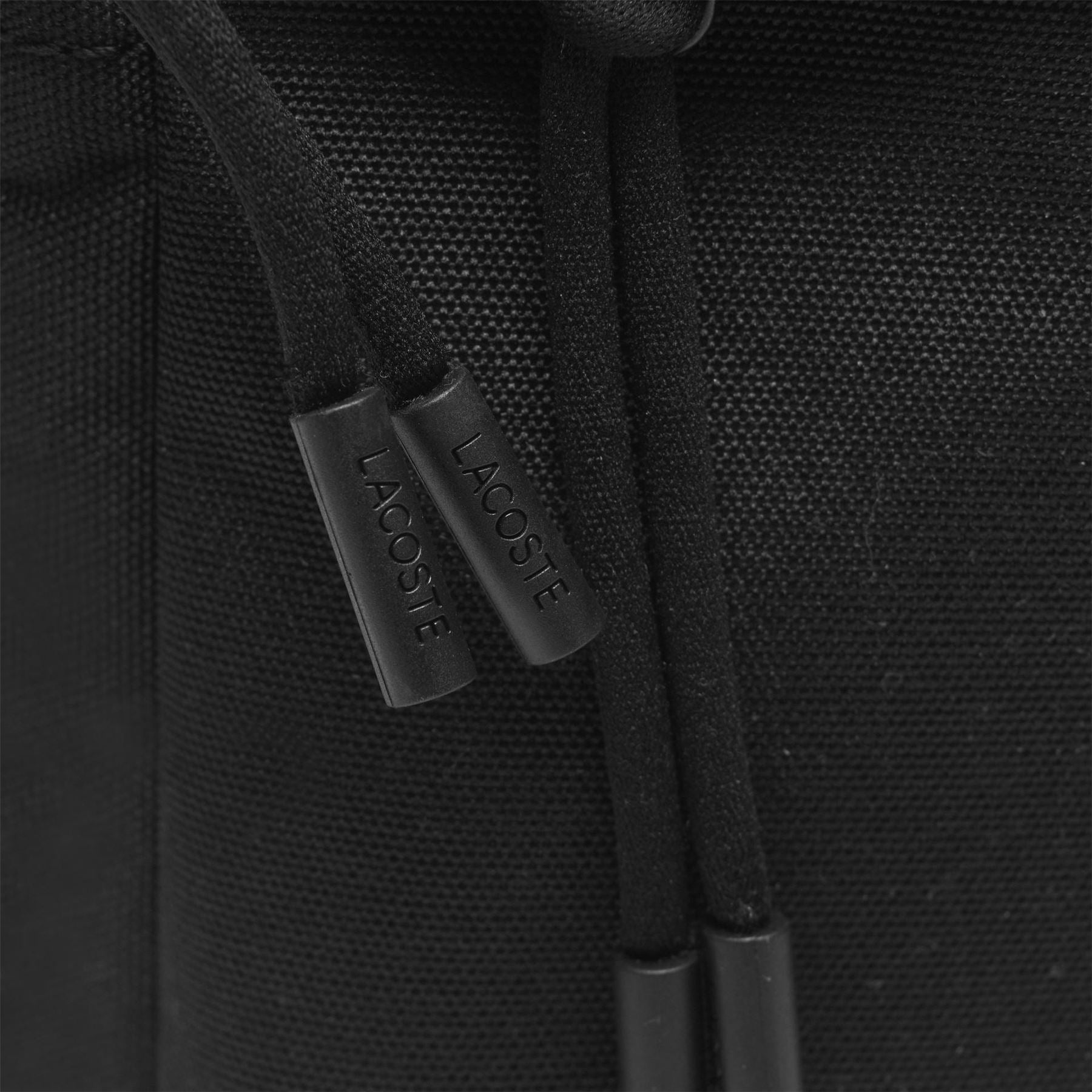 Lacoste Canvasas Vertical Camera Bag