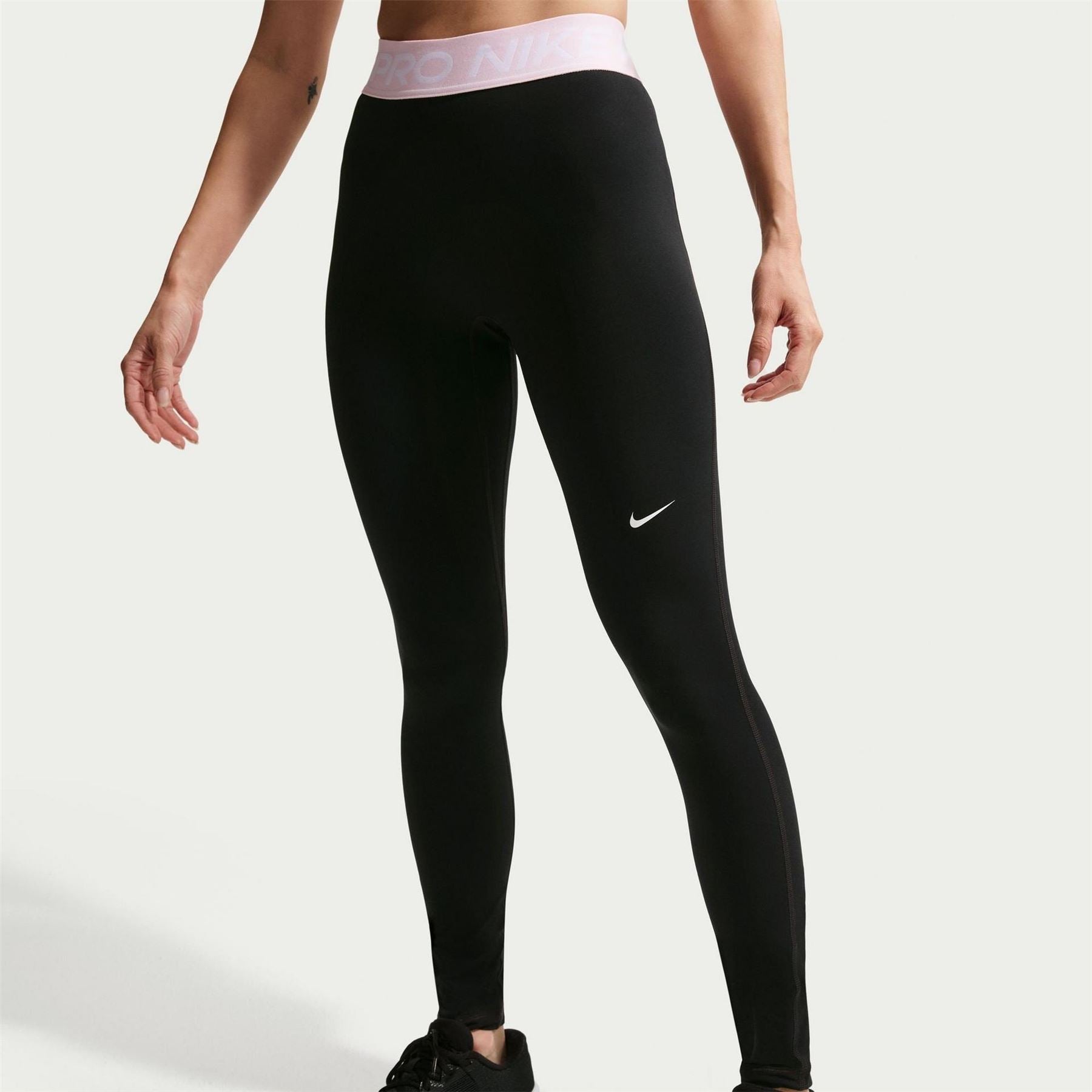 Nike Essential Solid Patterned Skinny Fit Leggings
