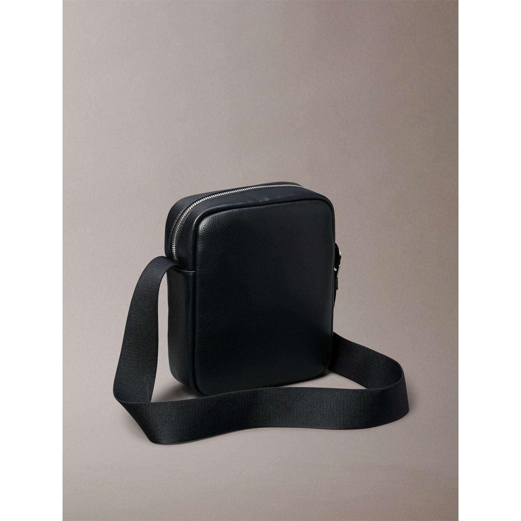 Calvin Klein Raised Reporter Cross Body Bag