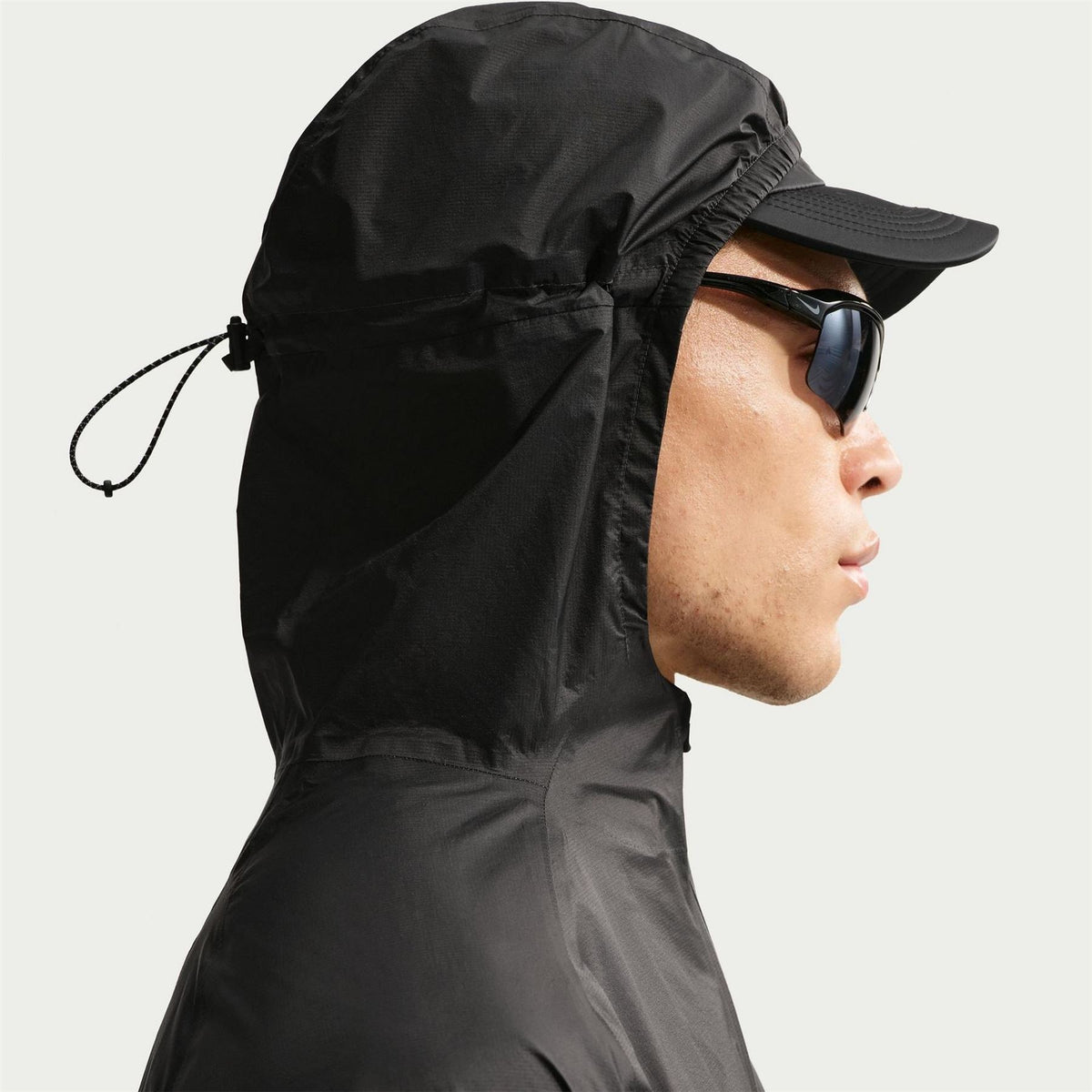 Nike Trail Solid Patterned Hooded Drawstring Windbreaker with Storm Flap