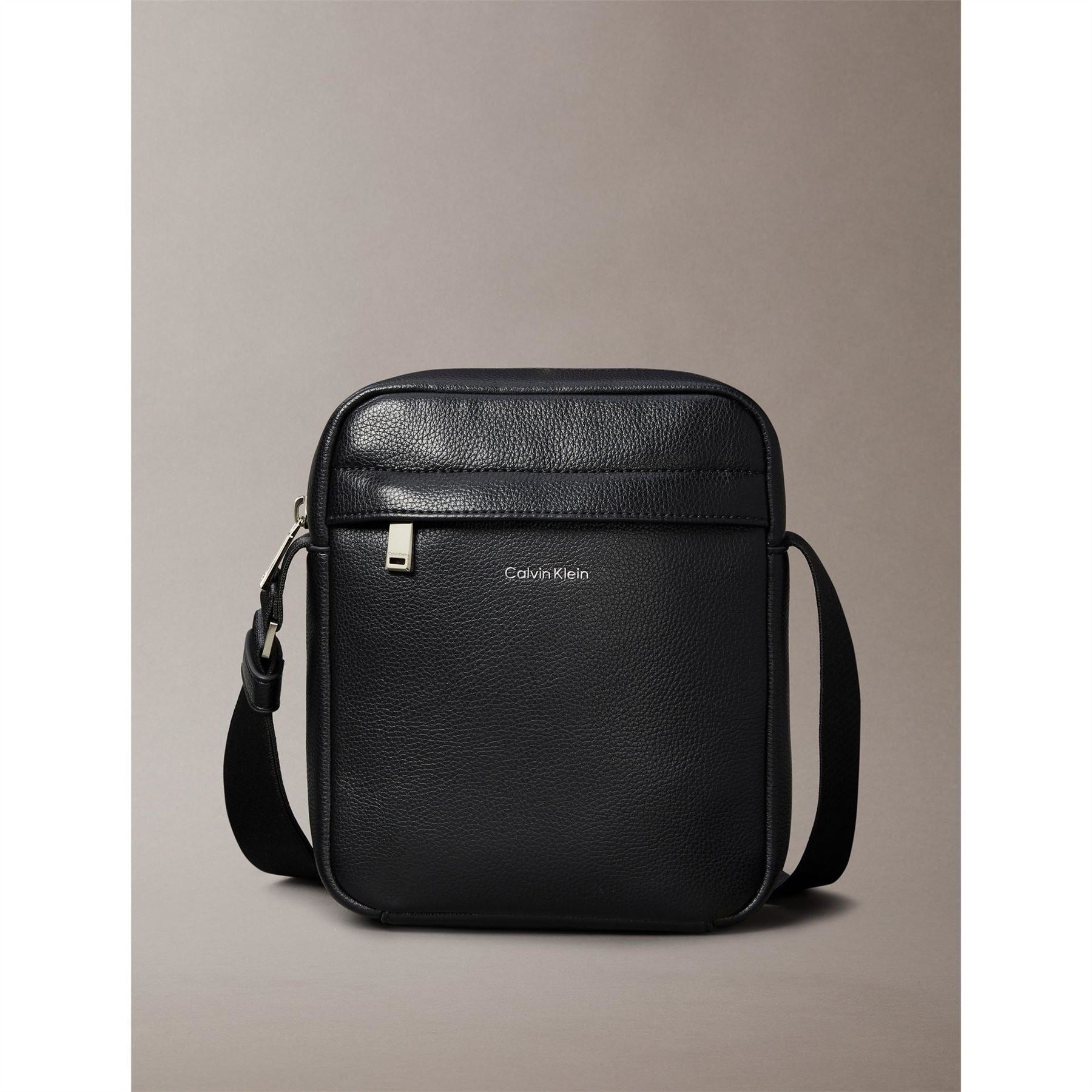 Calvin Klein Raised Reporter Cross Body Bag