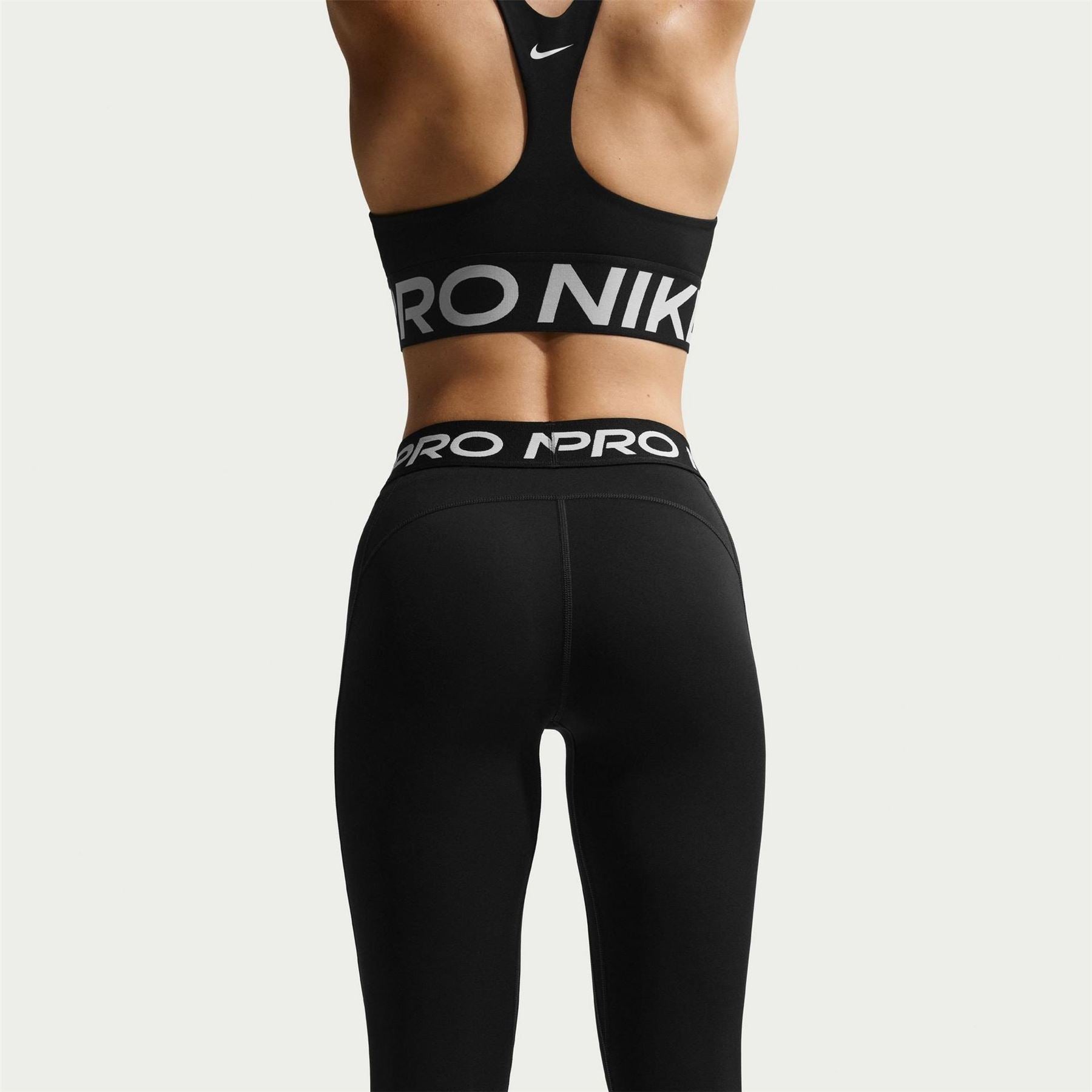 Nike Essential Solid Patterned Skinny Fit Leggings