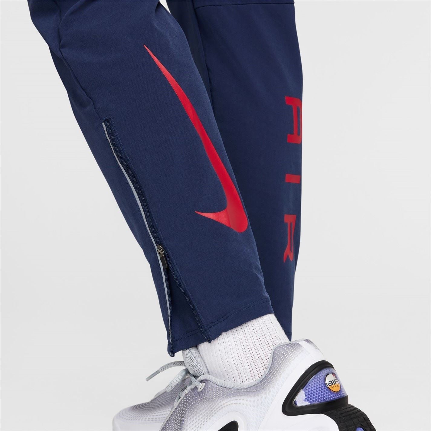 Nike Air Run Solid Patterned Track Pants