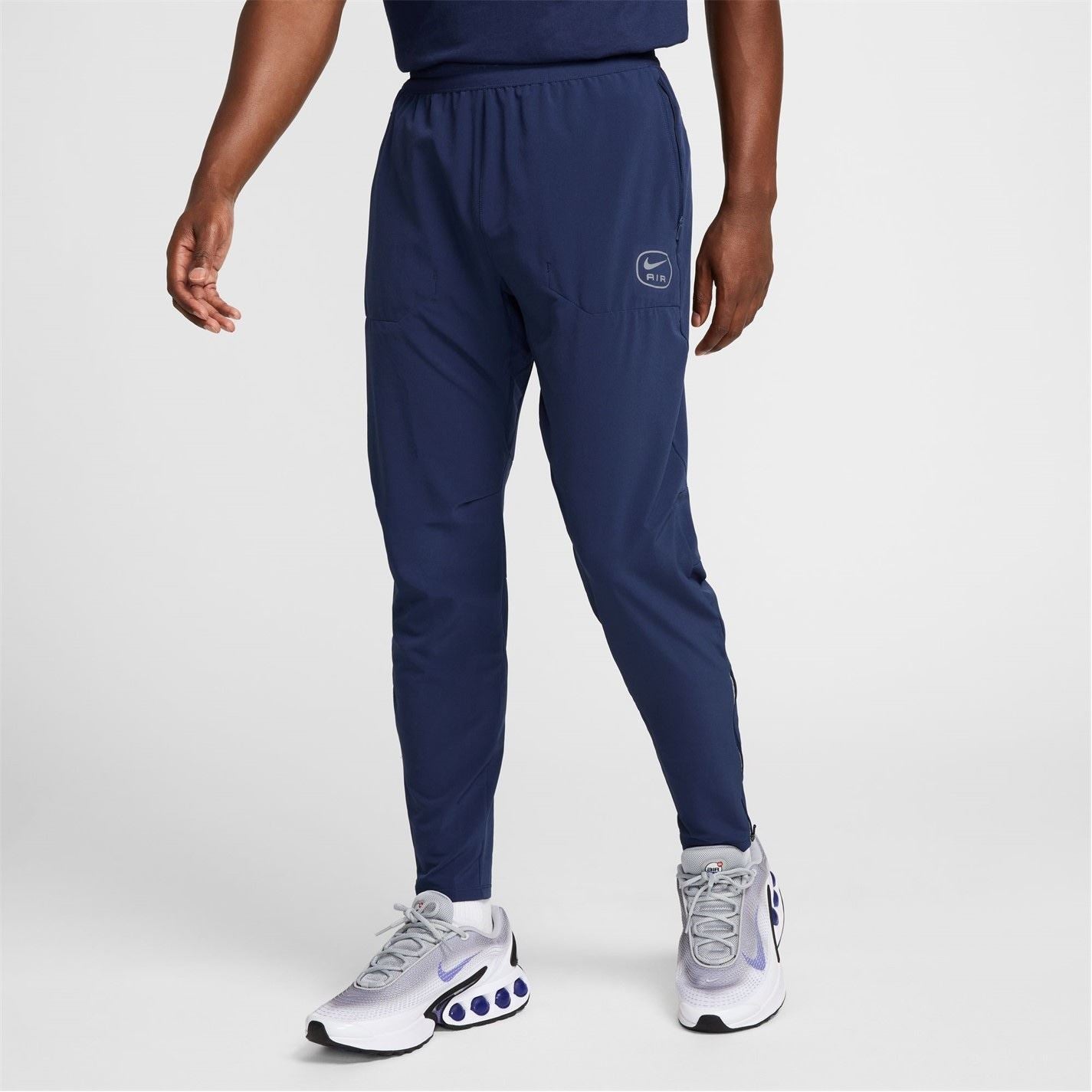 Nike Air Run Solid Patterned Track Pants