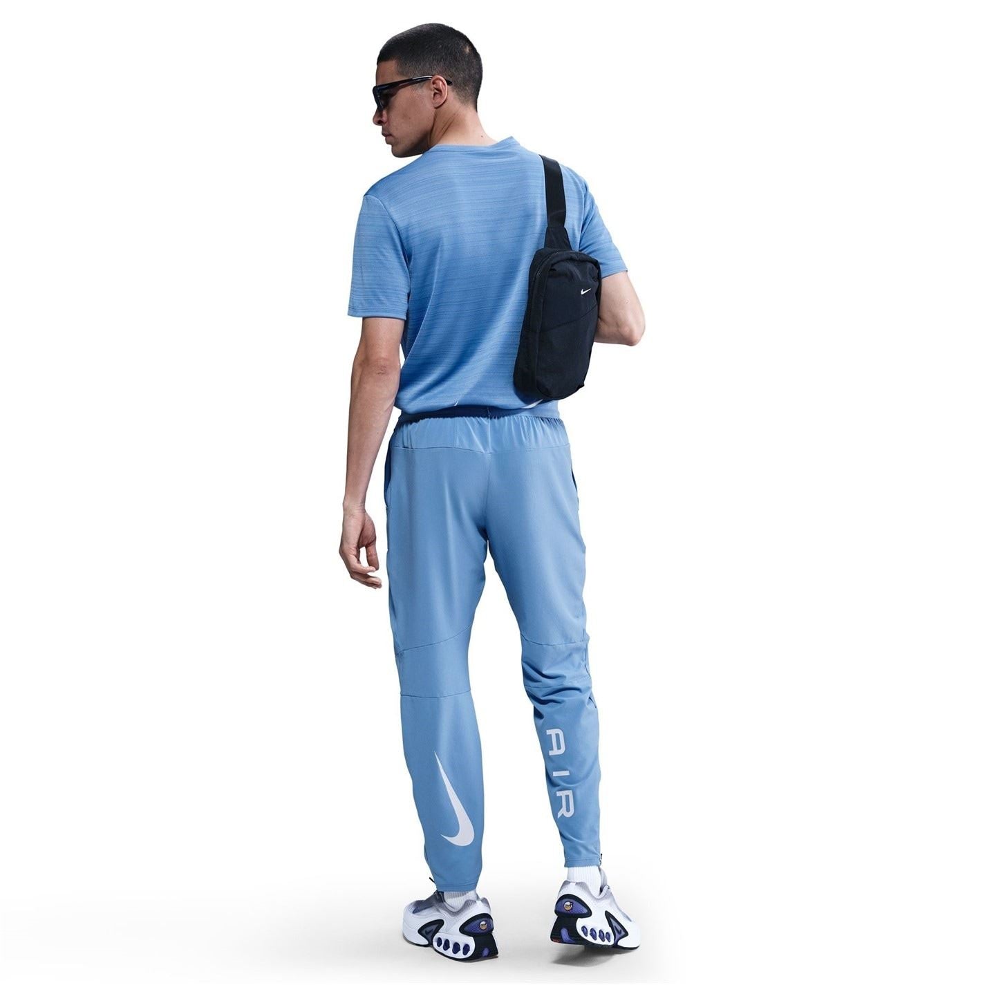 Nike Air Run Solid Patterned Track Pants