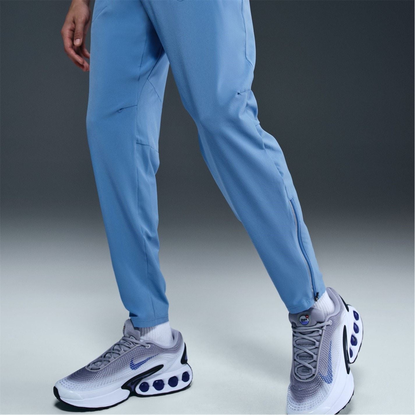Nike Air Run Solid Patterned Track Pants