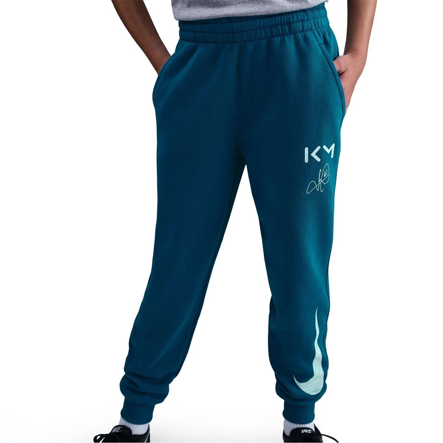 Nike Km Solid Patterned Fleece Joggers