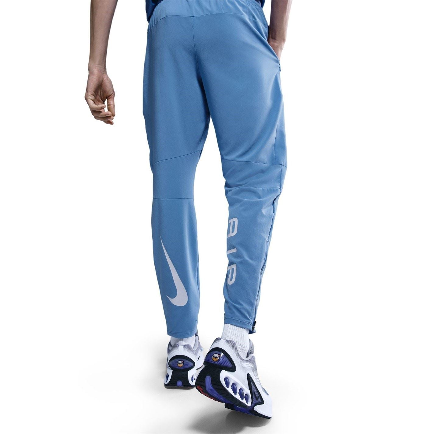 Nike Air Run Solid Patterned Track Pants
