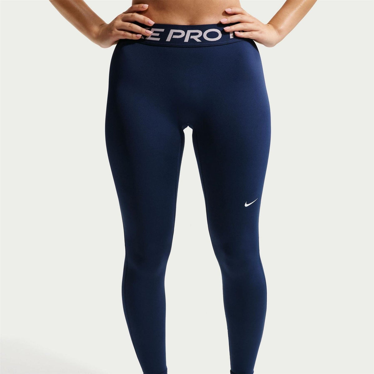 Nike Essential Solid Patterned Skinny Fit Leggings
