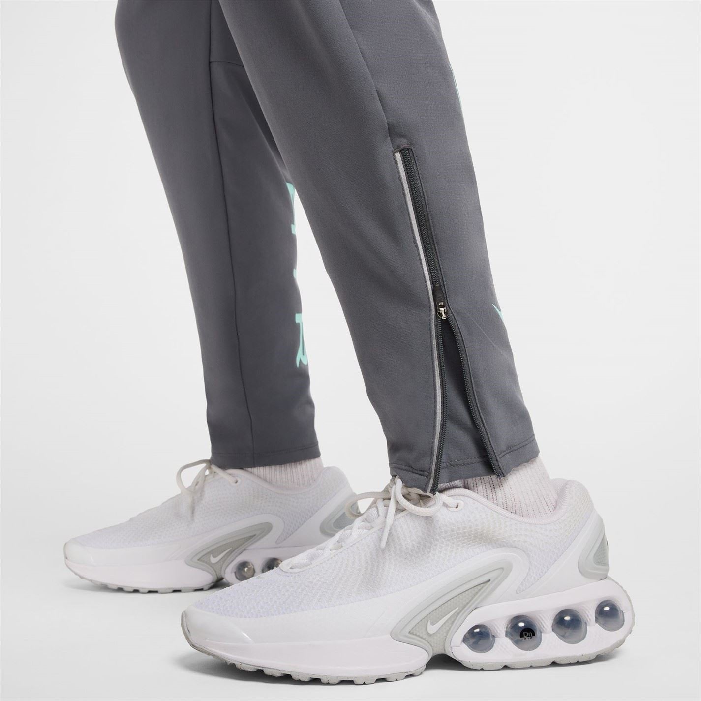 Nike Air Run Solid Patterned Track Pants