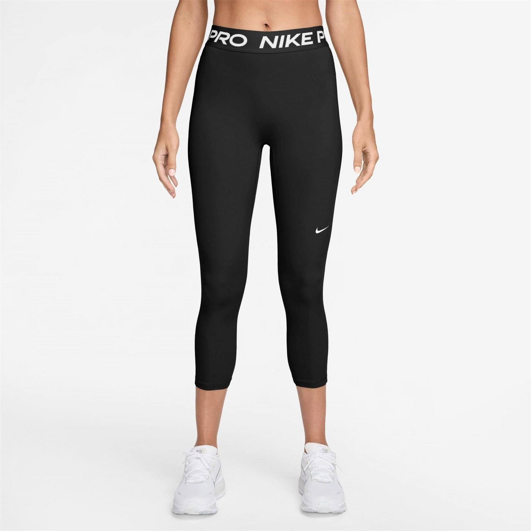Nike Essential Solid Patterned Skinny Fit Leggings