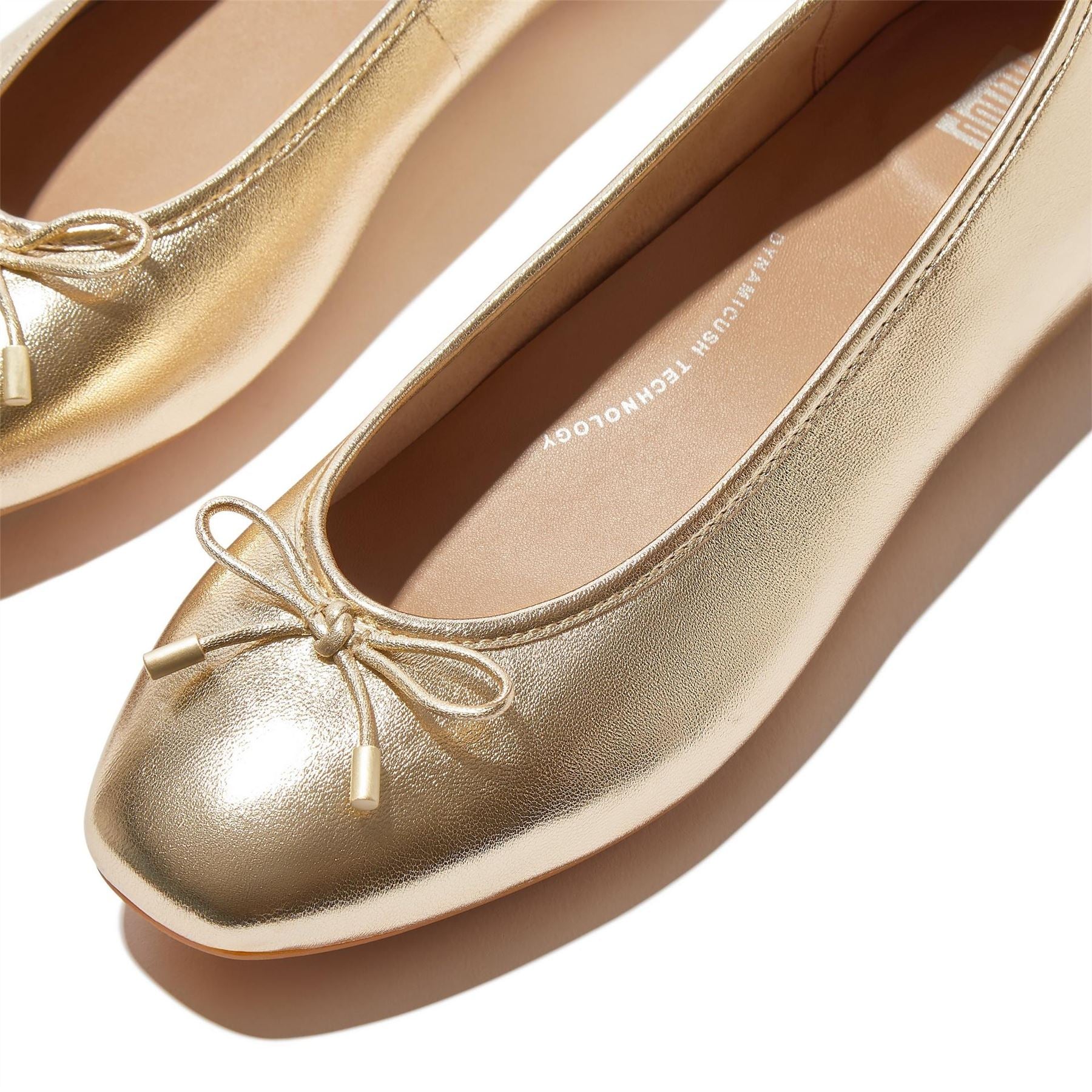 Fitflop Bow Metallic Round Toe Flat Heel Pumps