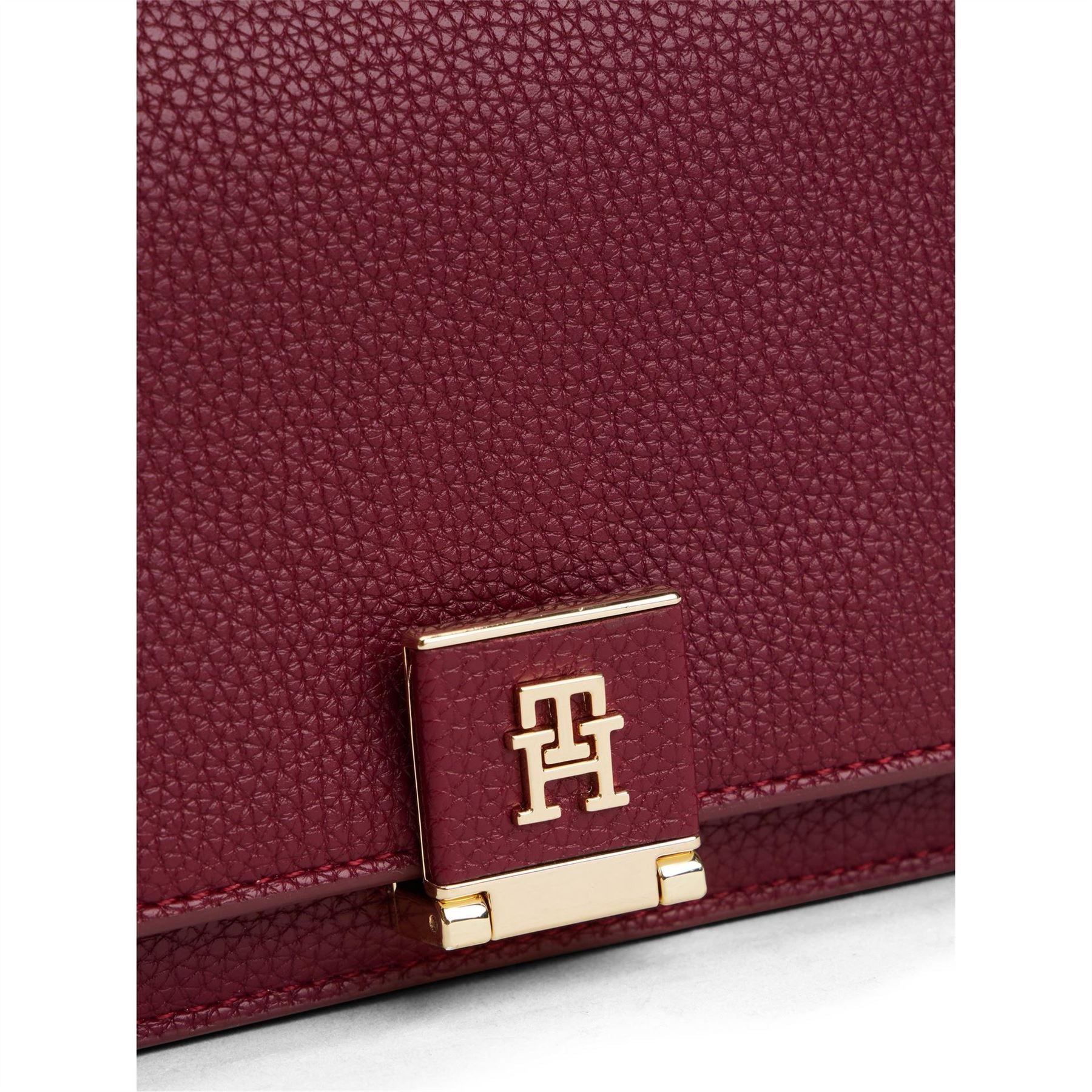 Tommy Hilfiger t
Textured Gold Tone Mini Cross Body Bag