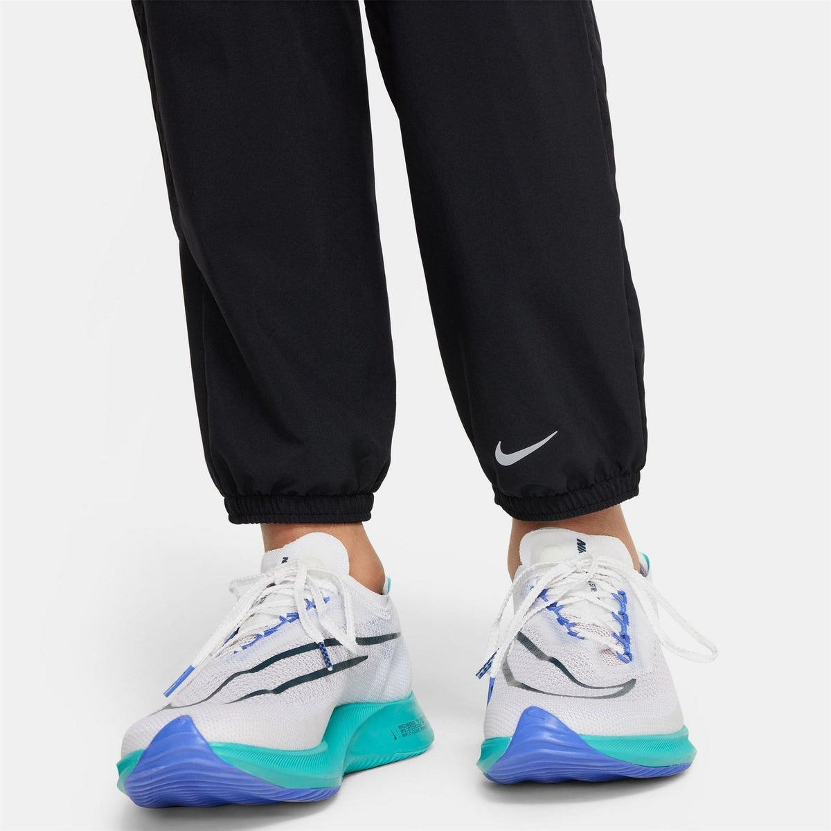 Nike Solid Mid Rise Regular Fit Athletic Pants