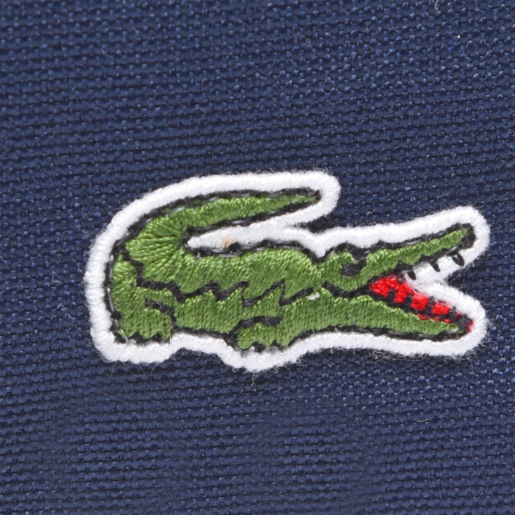 Lacoste Canvasas Vertical Camera Bag