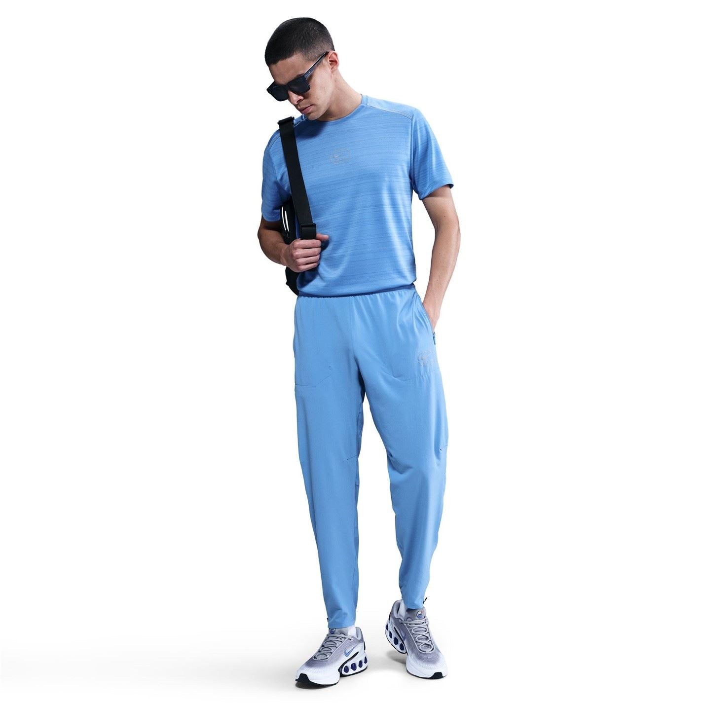 Nike Air Run Solid Patterned Track Pants