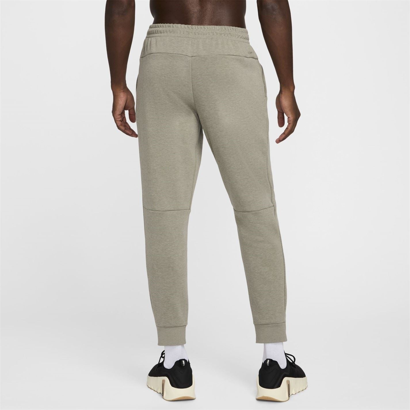 Nike Primary Solid Patterned Slim Joggers