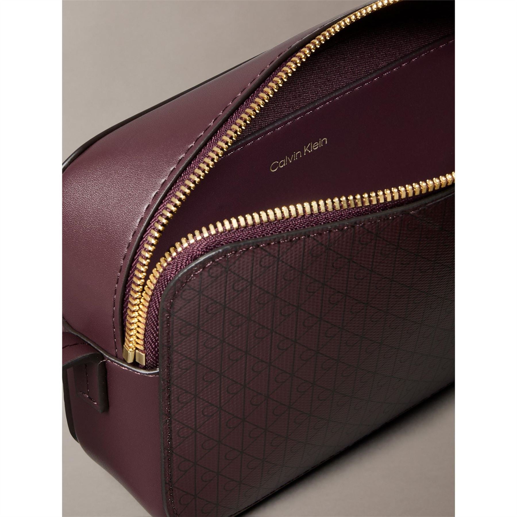 Calvin Klein AOP Camera Monogram Gold Tone Sling Bag