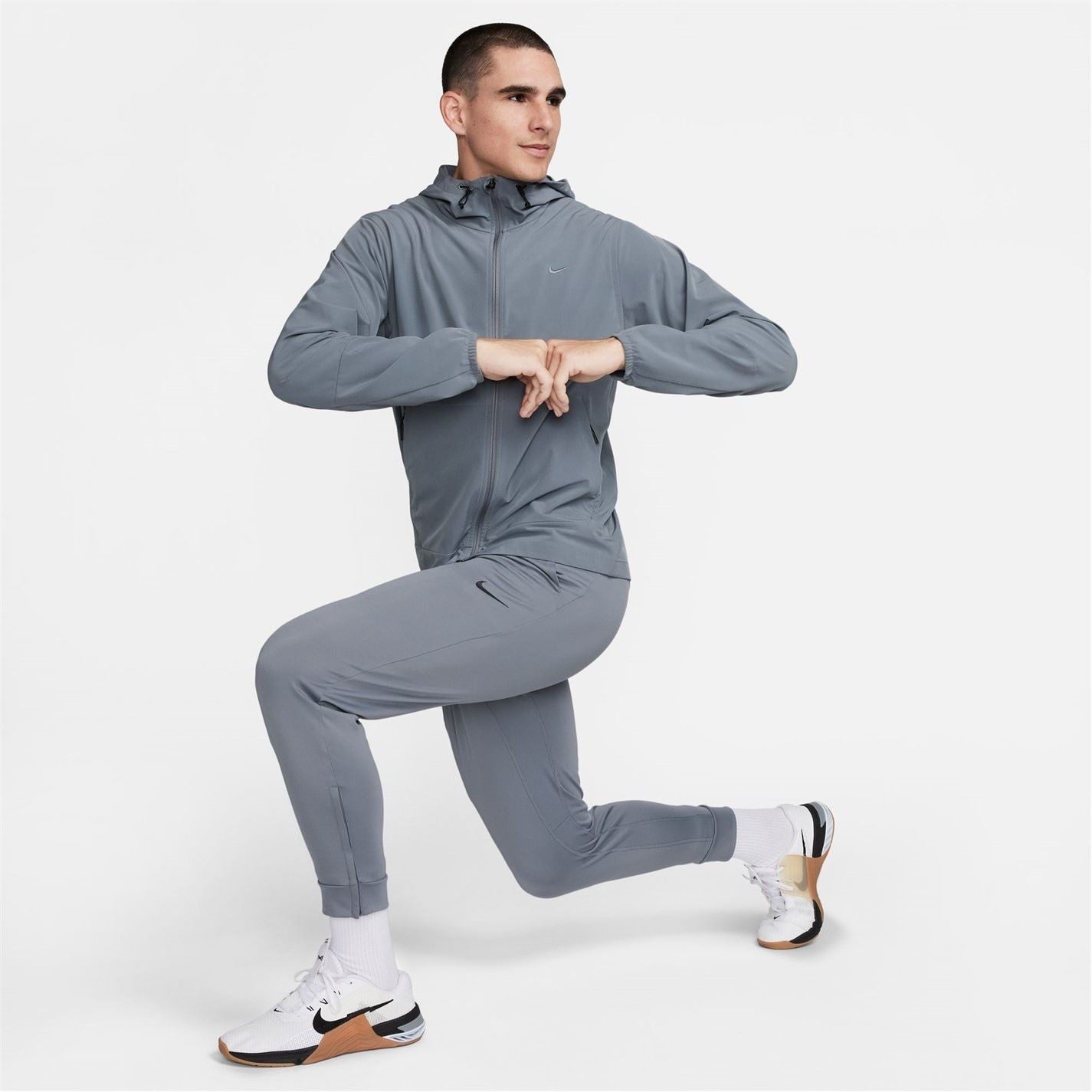 Nike Unlimited Hooded Performance Jacket with Zipped Pocket