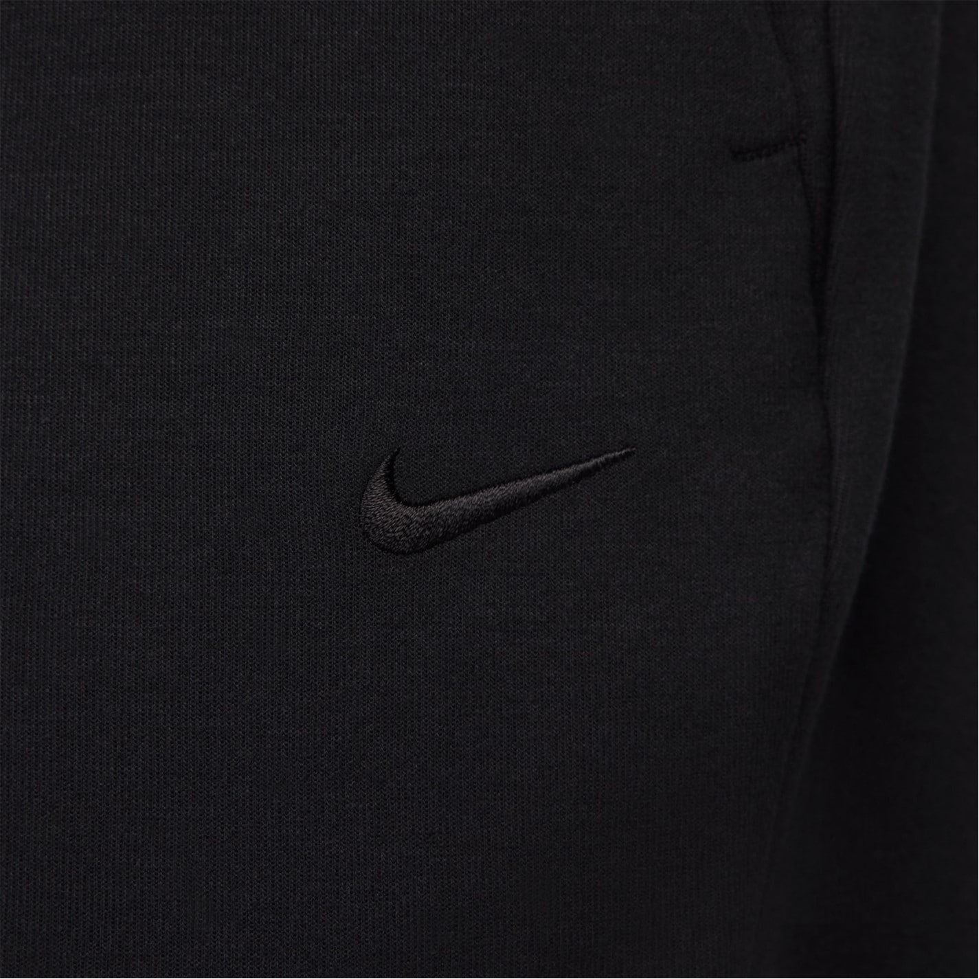 Nike Primary Solid Patterned Slim Joggers