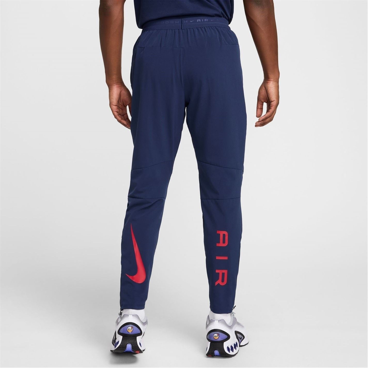 Nike Air Run Solid Patterned Track Pants