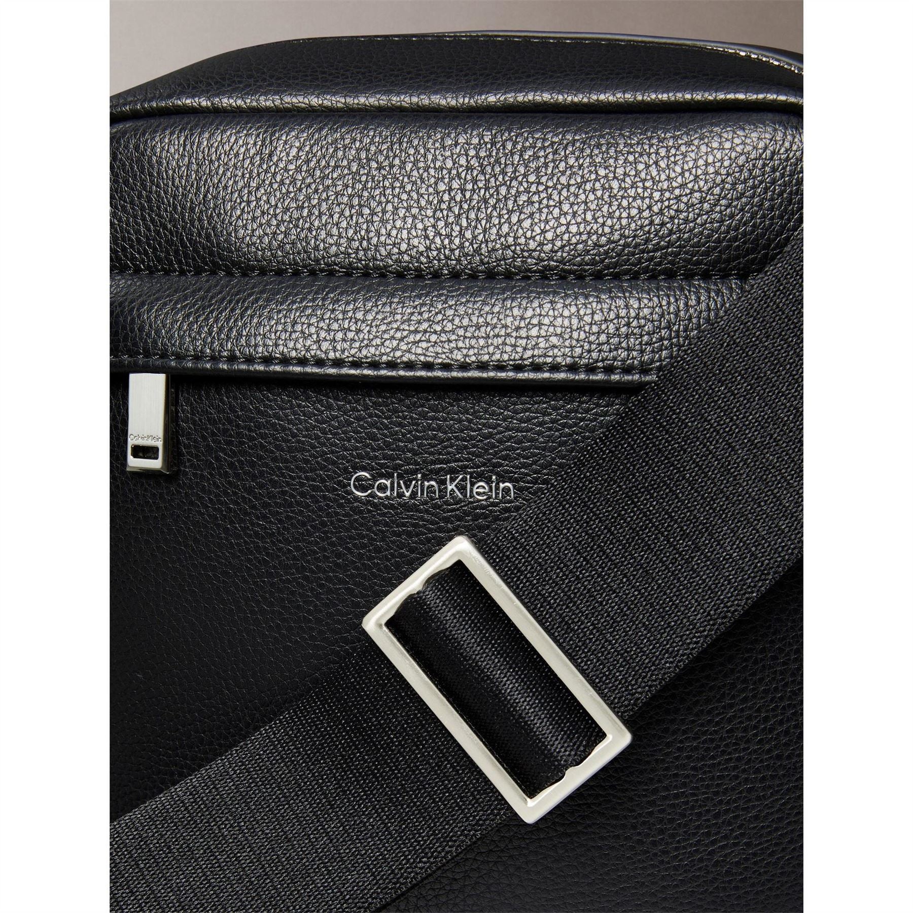 Calvin Klein Raised Reporter Cross Body Bag