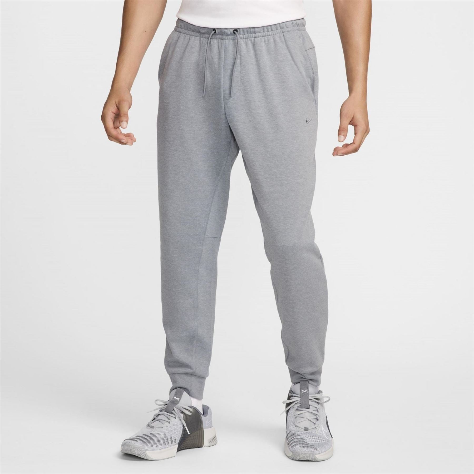 Nike Primary Solid Patterned Slim Joggers