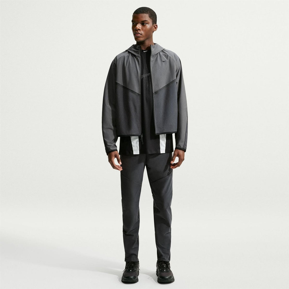 Nike Tech Solid Patterned Hooded Windbreaker with Woven Cuff