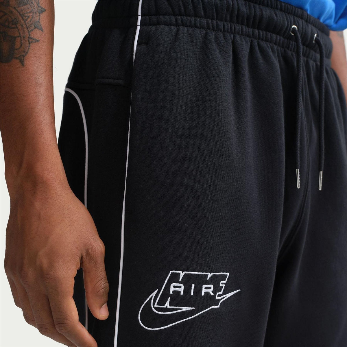 Nike Air Fleece Solid Patterned Slim Joggers