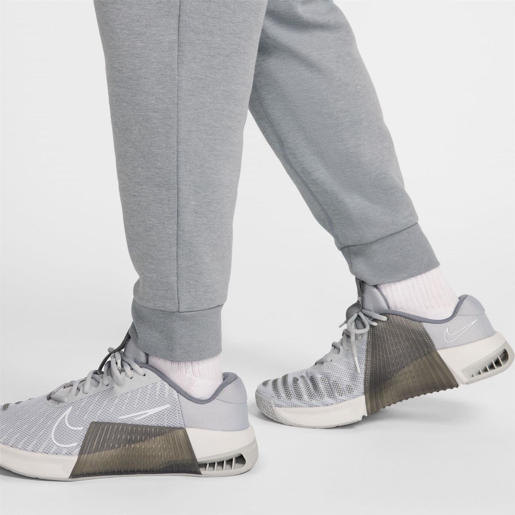 Nike Primary Solid Patterned Slim Joggers