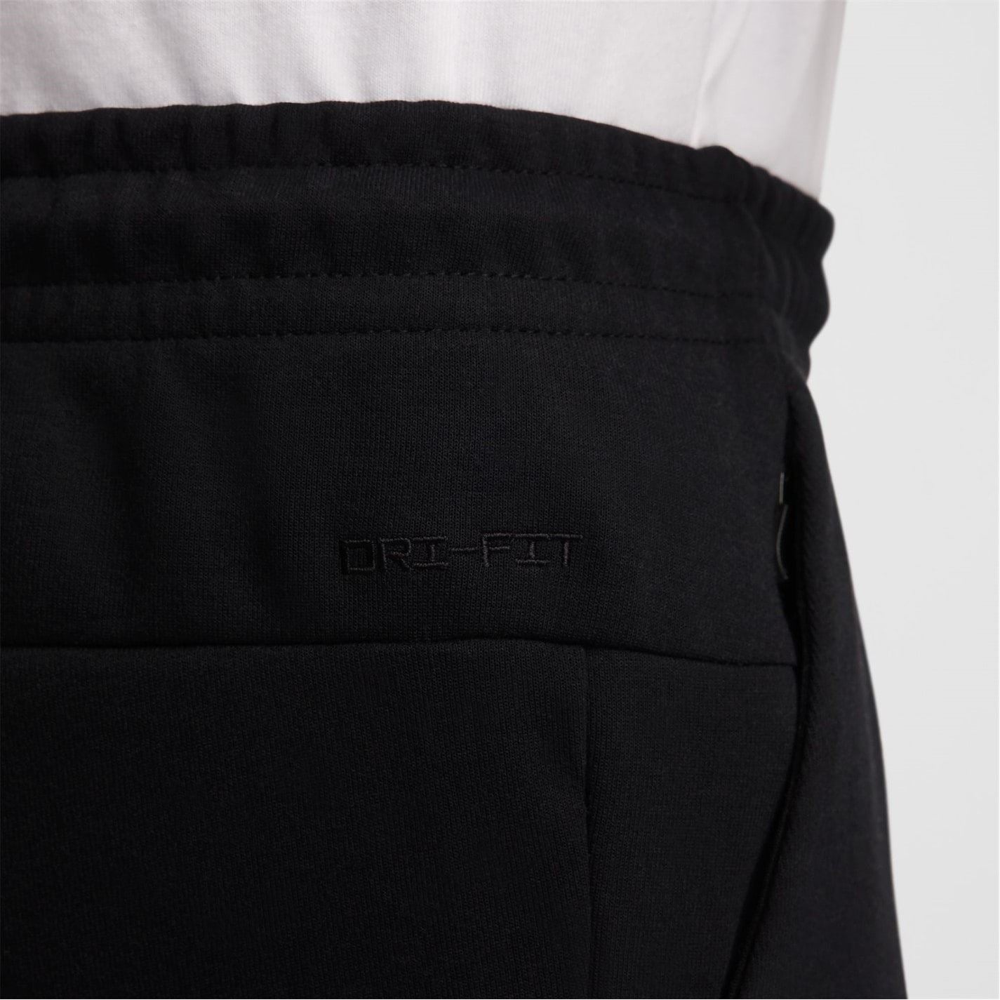 Nike Primary Solid Patterned Slim Joggers