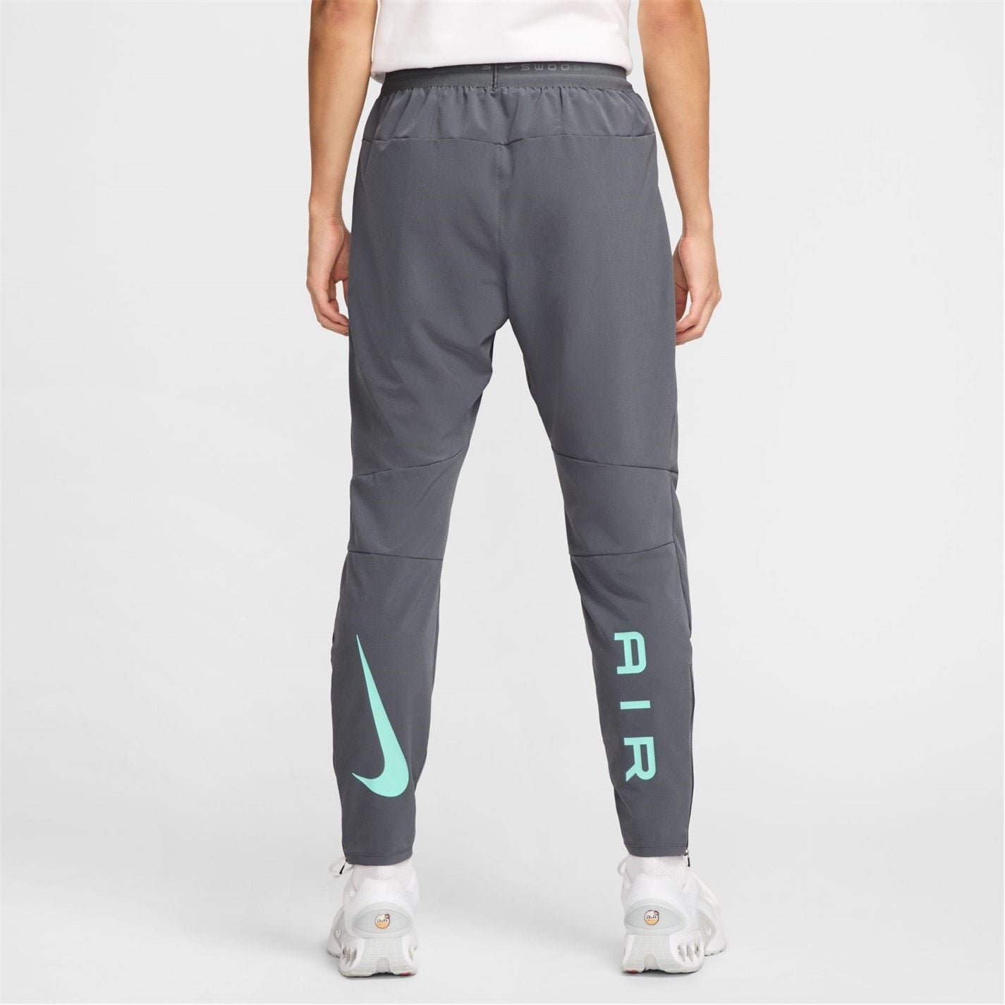 Nike Air Run Solid Patterned Track Pants