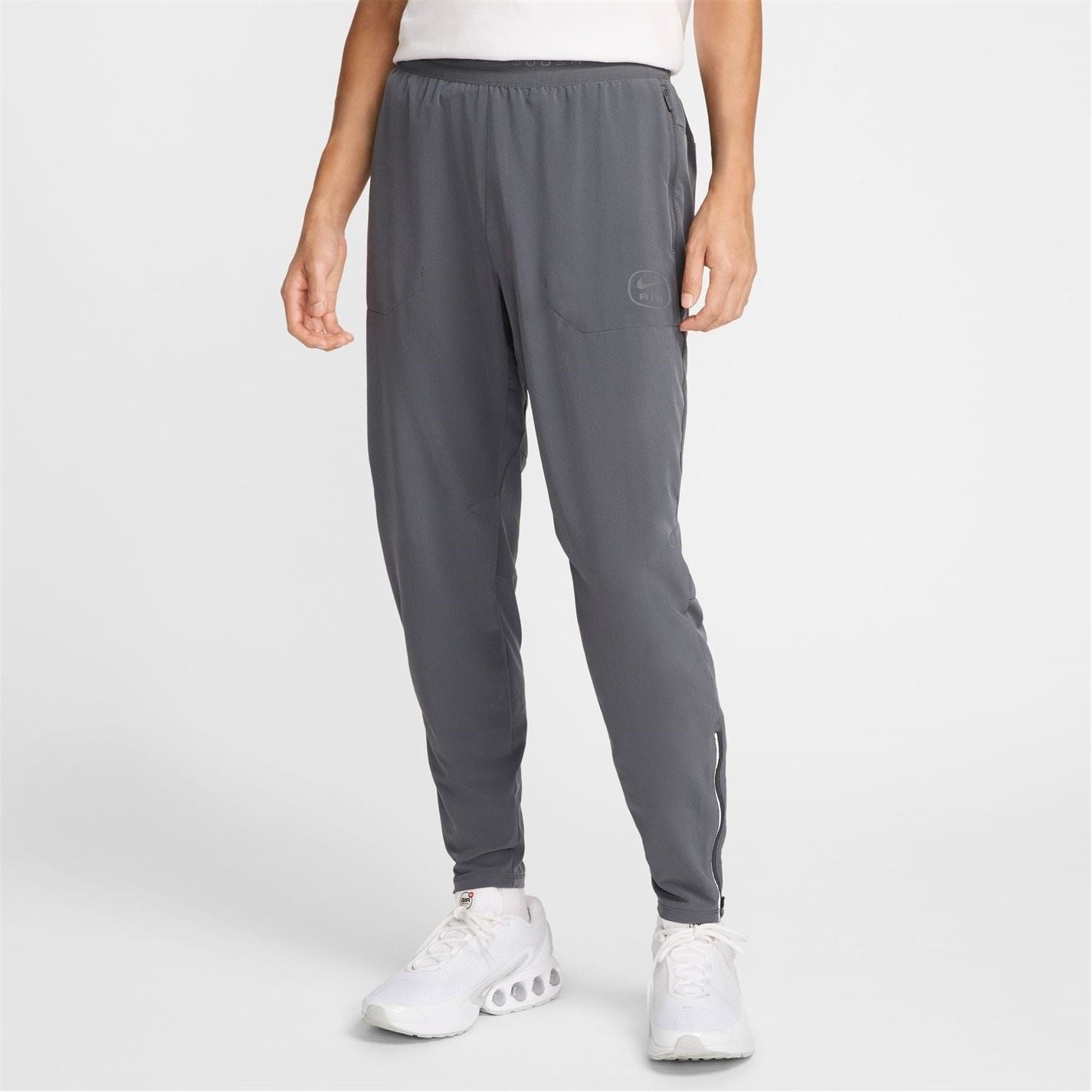 Nike Air Run Solid Patterned Track Pants
